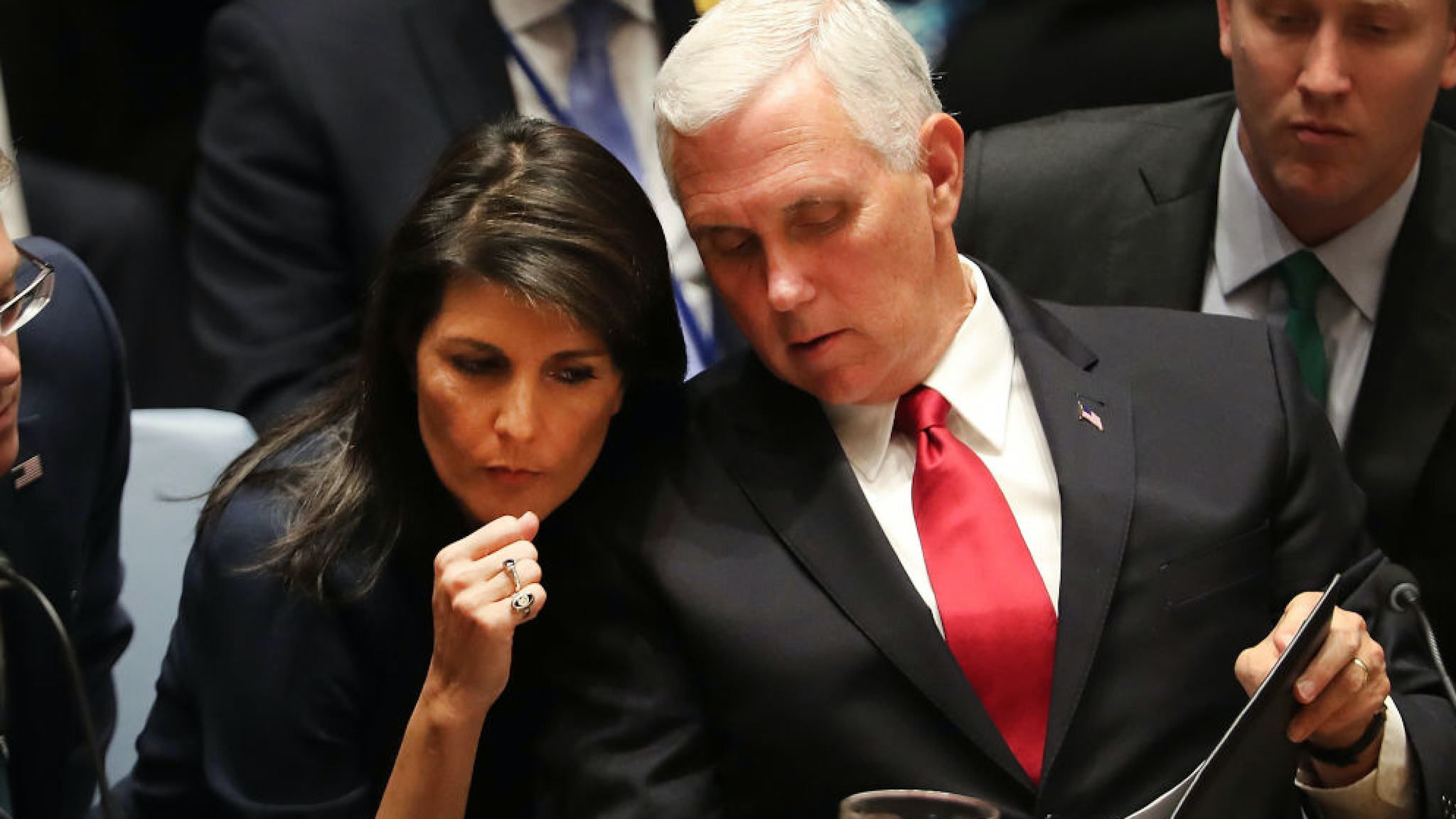 U.S. Vice President Mike Pence confers with U.S. Ambassador to the United Nations (U.N) Nikki Haley at a Security Council meeting during the 72nd U.N. General Assembly at U.N. headquarters on September 20, 2017 in New York City.