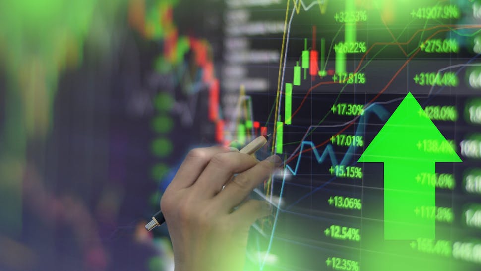 Close-Up Of Hand Analyzing Stock Market Data On Screen Green stock market graph chart with indicator investment trading stock exchange trading market monitor screen close up.