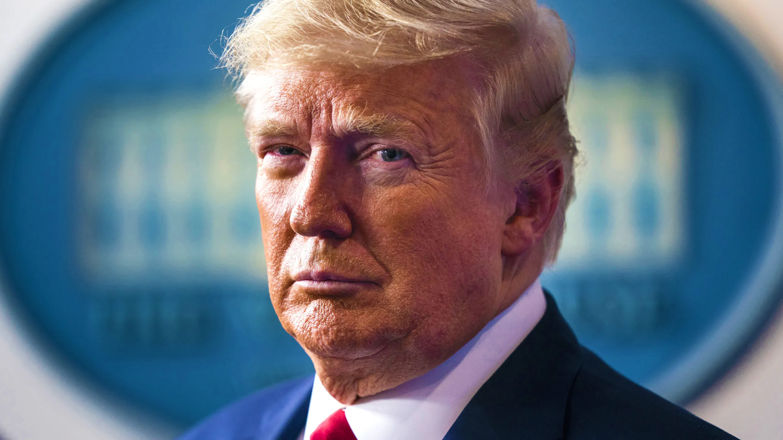 U.S. President Donald Trump pauses during a Coronavirus Task Force news conference in the briefing room of the White House in Washington, D.C., U.S., on Sunday, March 22, 2020. Trump said that he will work with House Speaker Nancy Pelosi to get stimulus package and expects Congress to pass it.