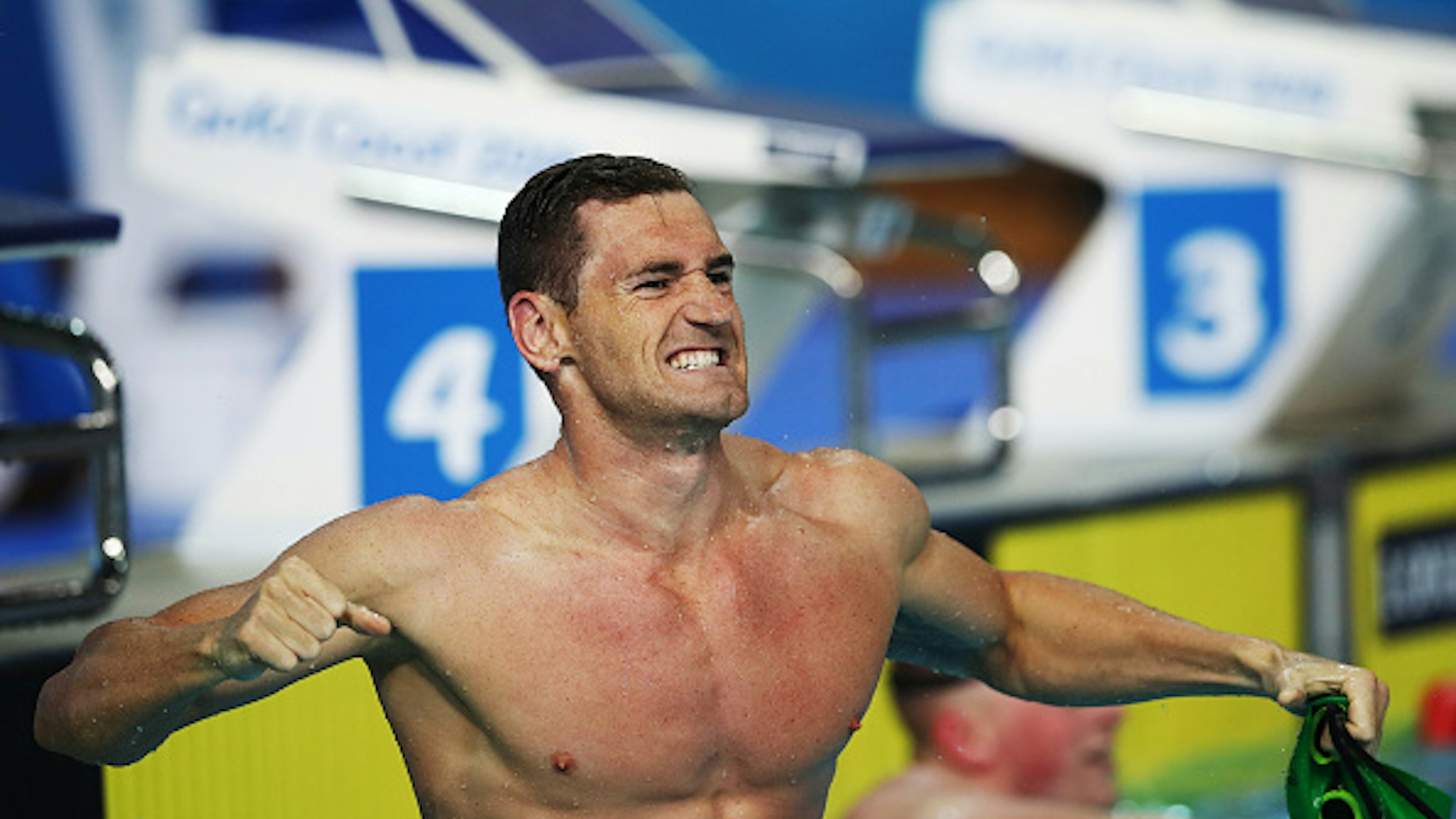 GOLD COAST, AUSTRALIA - APRIL 09: Cameron van der Burgh of South Africa celebrates after winning the Men's 100m Breaststroke on day five of the Gold Coast 2018 Commonwealth Games at Optus Aquatic Centre on April 9, 2018 on the Gold Coast, Australia.