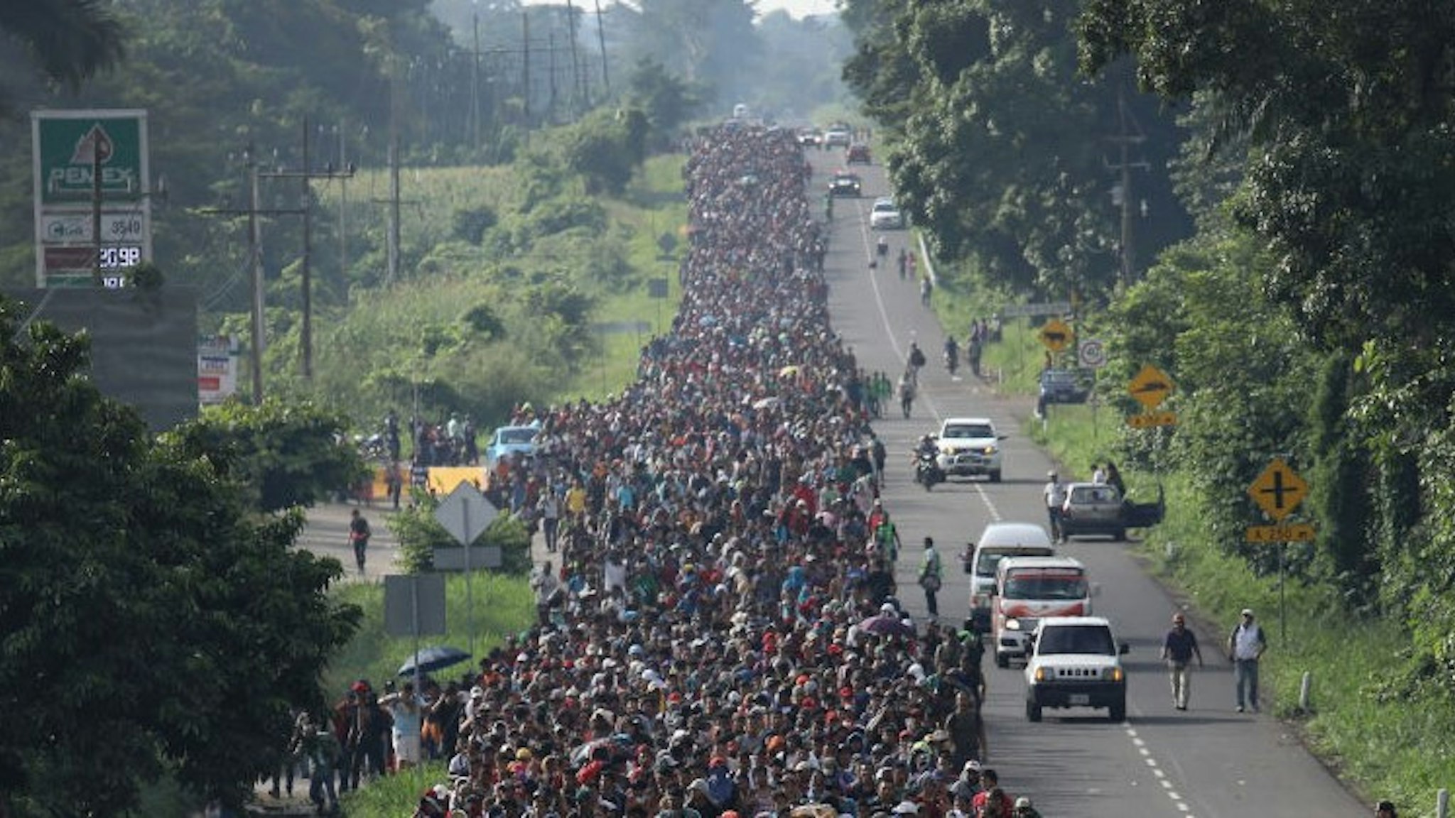 CIUDAD HIDALGO, MEXICO - OCTOBER 21: A migrant caravan walks into the interior of Mexico after crossing the Guatemalan border on October 21, 2018 near Ciudad Hidalgo, Mexico The caravan of Central Americans plans to eventually reach the United States. U.S. President Donald Trump has threatened to cancel the recent trade deal with Mexico and withhold aid to Central American countries if the caravan isn't stopped before reaching the U.S. (Photo by