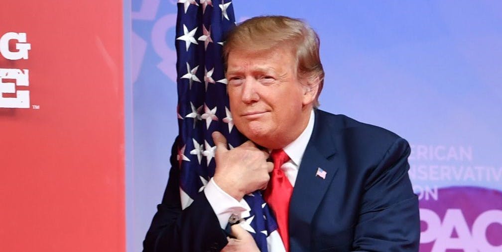Trump Signs Executive Order Urging One-Year Jail Sentence For Flag Burning
