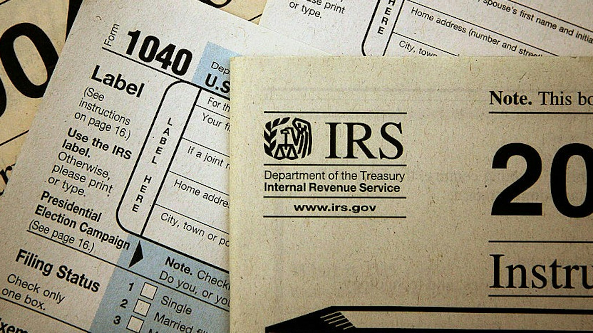CHICAGO - NOVEMBER 1: Current federal tax forms are distributed at the offices of the Internal Revenue Service November 1, 2005 in Chicago, Illinois. A presidential panel today recommended a complete overhaul of virtually every tax law for individuals and businesses. (Photo Illustration by