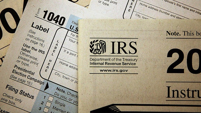 CHICAGO - NOVEMBER 1: Current federal tax forms are distributed at the offices of the Internal Revenue Service November 1, 2005 in Chicago, Illinois. A presidential panel today recommended a complete overhaul of virtually every tax law for individuals and businesses. (Photo Illustration by