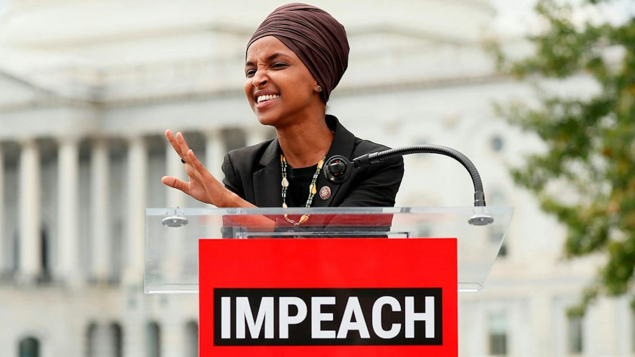 Rally To Demand “Impeachment Now!” WASHINGTON, DC - SEPTEMBER 26: Rep. Ilhan Omar (D-MN) speaks at the “Impeachment Now!” rally in support of an immediate inquiry towards articles of impeachment against U.S. President Donald Trump on the grounds of the U.S. Capital on September 26, 2019in Washington, DC. (Photo by
