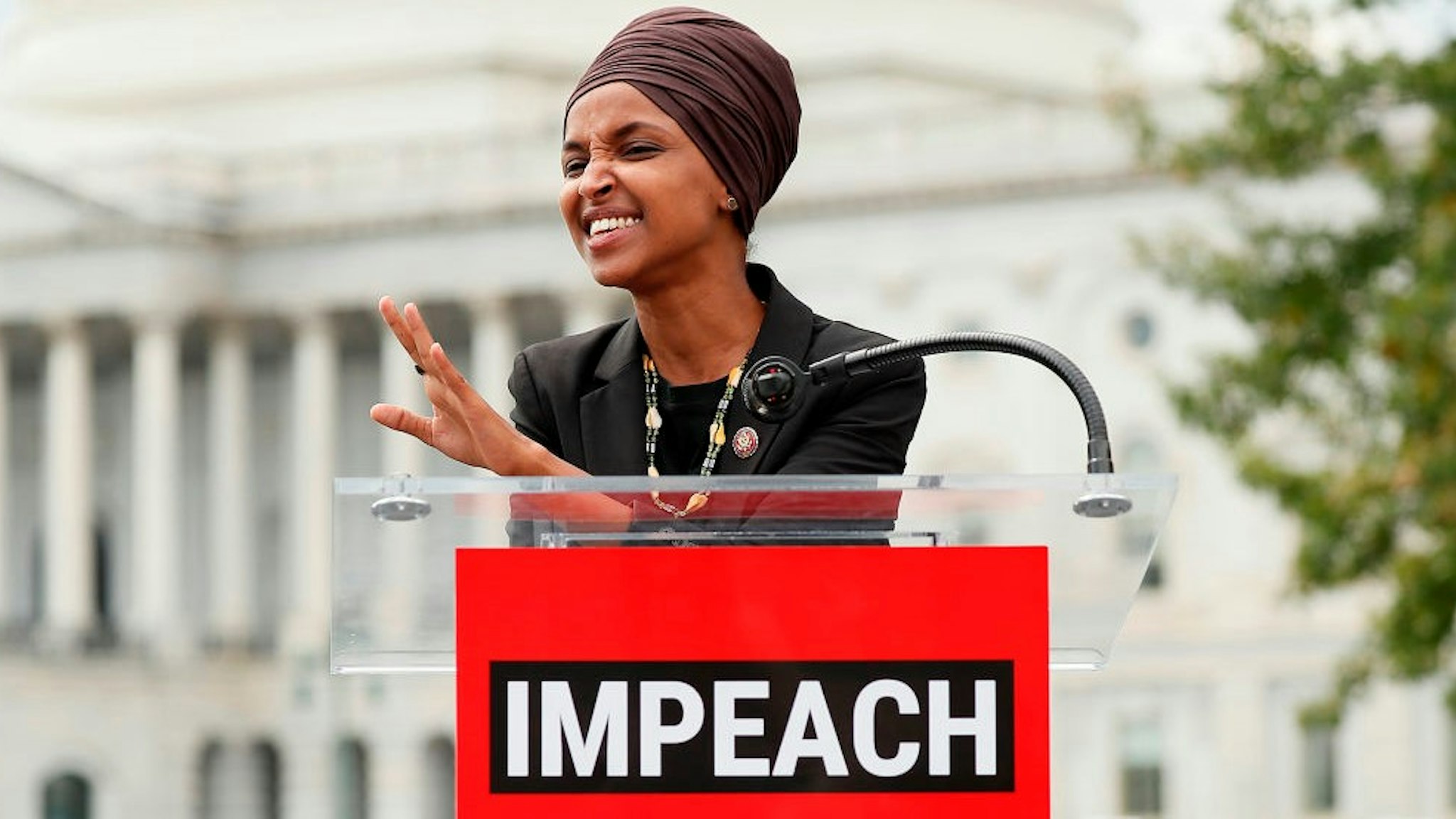 WASHINGTON, DC - SEPTEMBER 26: Rep. Ilhan Omar (D-MN) speaks at the “Impeachment Now!” rally in support of an immediate inquiry towards articles of impeachment against U.S. President Donald Trump on the grounds of the U.S. Capital on September 26, 2019in Washington, DC. (Photo by