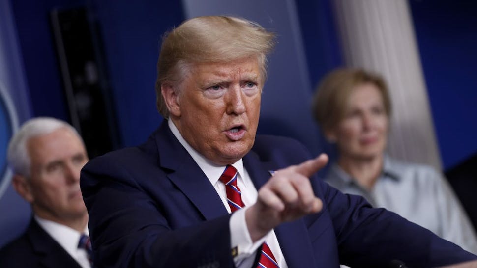 Members Of The Coronavirus Task Force Hold Press Briefing U.S. President Donald Trump speaks during a Coronavirus Task Force news conference in the briefing room of the White House in Washington, D.C., U.S., on Friday, March 20, 2020. Americans will have to practice social distancing for at least several more weeks to mitigate U.S. cases of Covid-19, Anthony S. Fauci of the National Institutes of Health said today. Photographer: