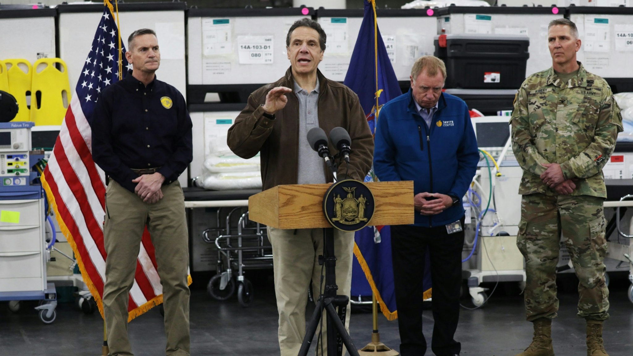 New York Governor Andrew Cuomo speaks to the media and members of the National Guard at the Javits Convention Center which is being turned into a hospital to help fight coronavirus cases on March 23, 2020 in New York City.