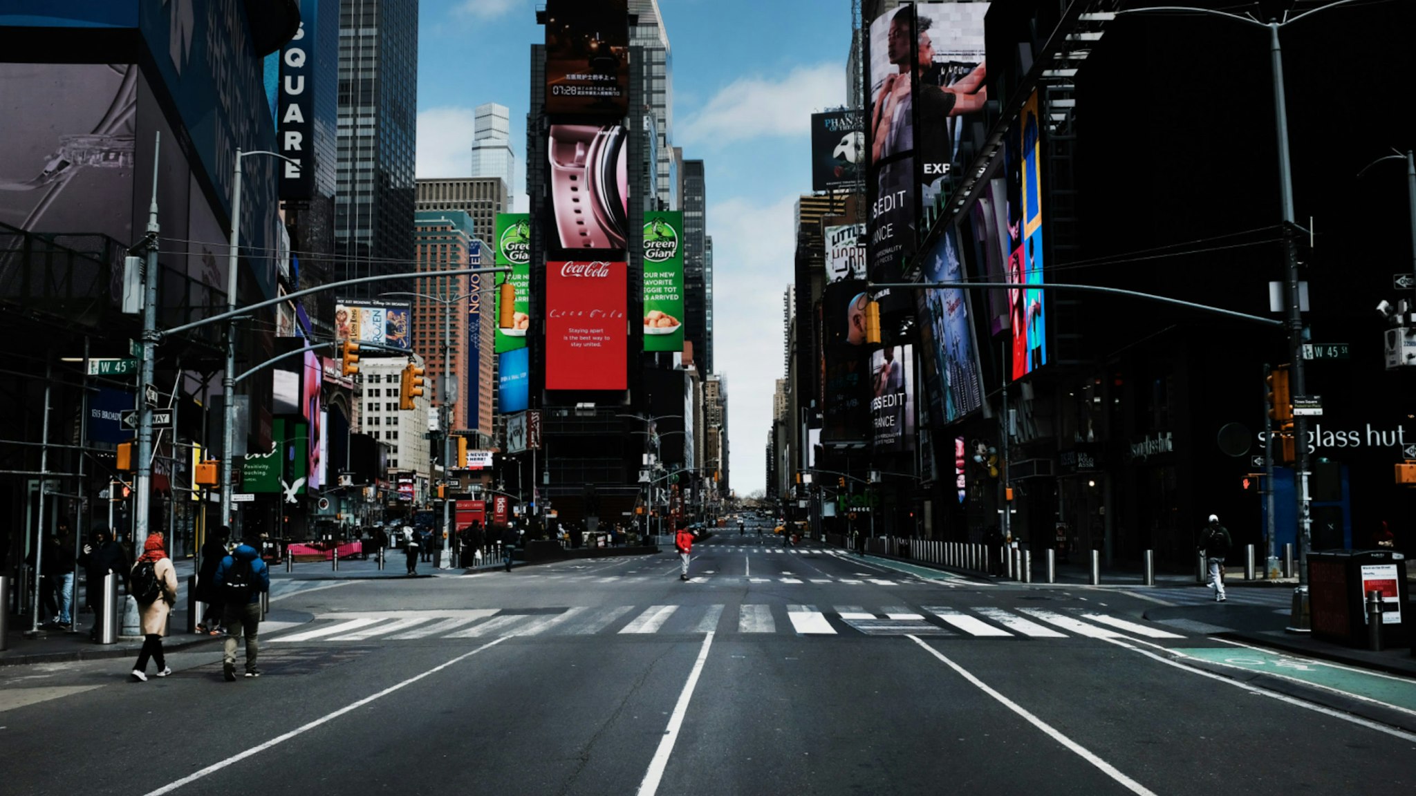 Times Square stands mostly empty as as much of the city is void of cars and pedestrians over fears of spreading the coronavirus on March 22, 2020 in New York City.