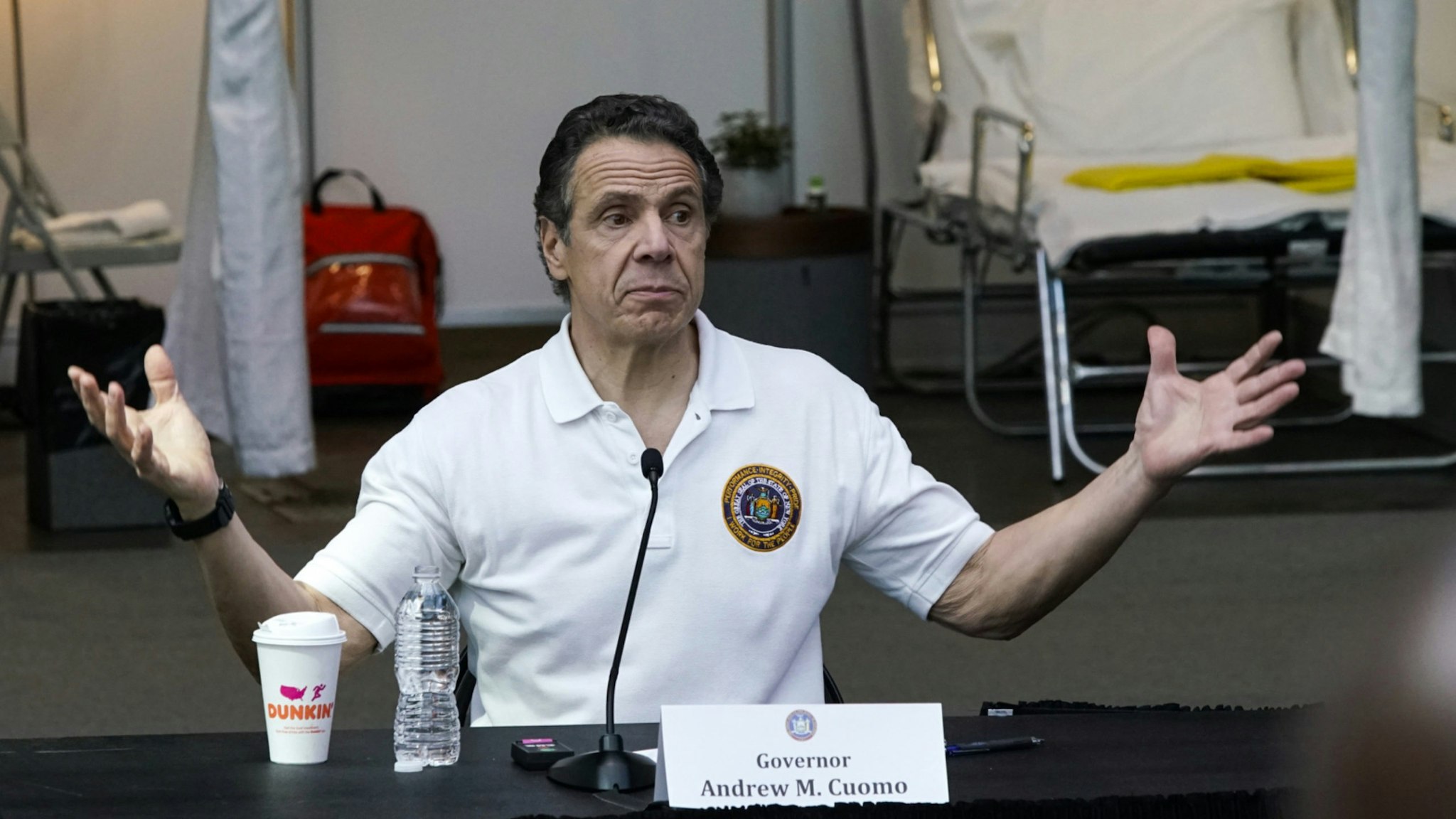 New York Gov Andrew Cuomo gives a daily coronavirus press conference in front of media and National Guard members at the Jacob K. Javits Convention Center, which is being turned into a hospital to help fight coronavirus cases on March 27, 2020 in New York City.