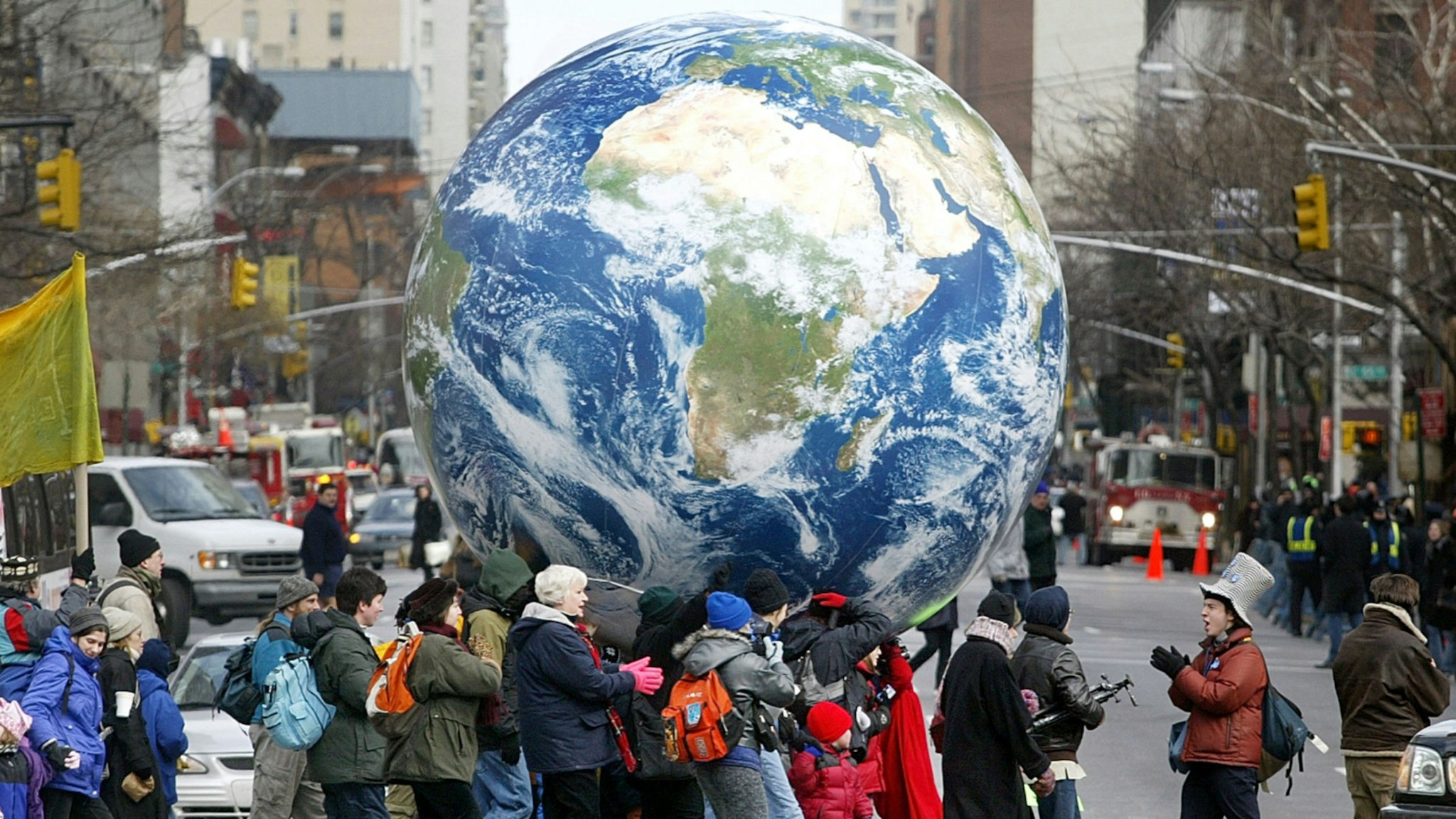 Protesters carry an inflatable globe during an anti-war demonstration February 15, 2003 in New York City. Tens of thousands attended the rally which coincided with peace demonstrations around the world.