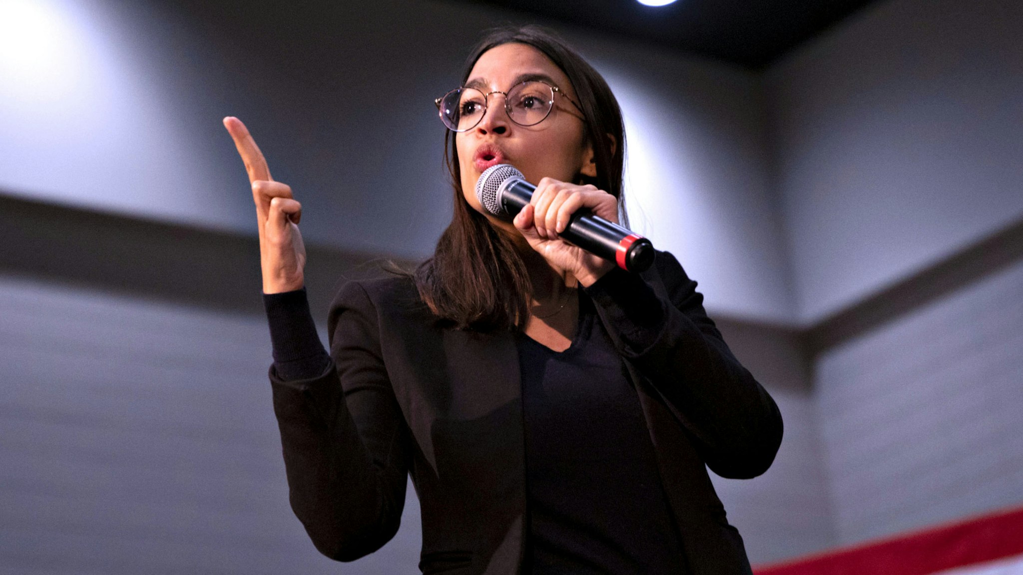 U.S. Representative Alexandria Ocasio-Cortez, a Democrat from New York, speaks during a campaign rally for Senator Bernie Sanders, an Independent from Vermont and 2020 presidential candidate, not pictured, in Sioux City, Iowa, U.S., on Sunday, Jan. 26, 2020. New polls showed the unsettled state of the Democratic primary days before the first voters weigh in at the Iowa caucuses, with front-runner status still unclear.