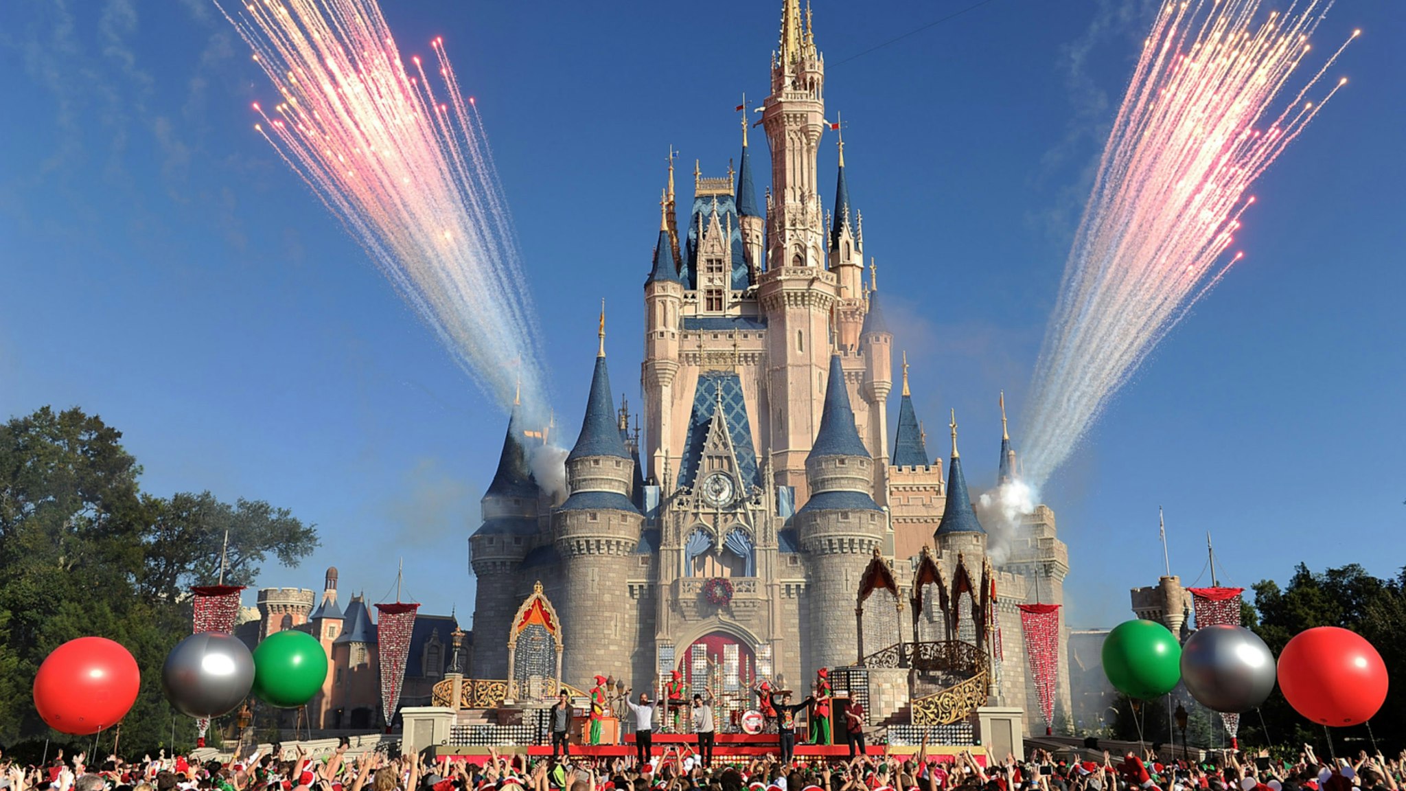 In this handout photo provided by Disney Parks, English-Irish boy band The Wanted performs "Santa Claus is Coming To Town" while taping the Disney Parks Christmas Day Parade TV special December 6, 2013 at the Magic Kingdom park at Walt Disney World Resort in Lake Buena Vista, Florida.