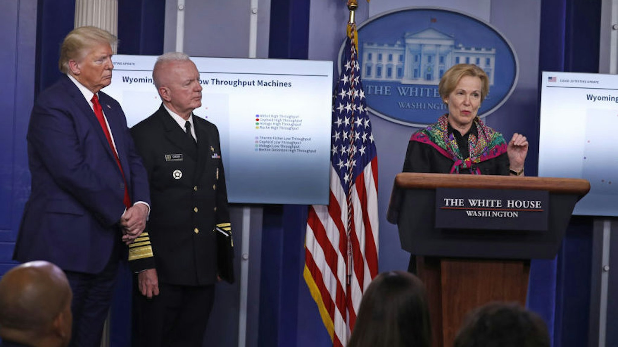 Deborah Birx, coronavirus response coordinator, speaks as U.S. President Donald Trump, left, and Brett Giroir, U.S. assistant secretary for health, second left, listen during a news conference at the White House in Washington D.C., U.S. on Monday, April 20, 2020. Negotiations between Democrats and the Trump administration on a deal to replenish a small business aid program and assist hospitals spilled into Monday as both sides raced to put together a package that Congress could approve this week. Photographer: Tasos Katopodis/Bloomberg