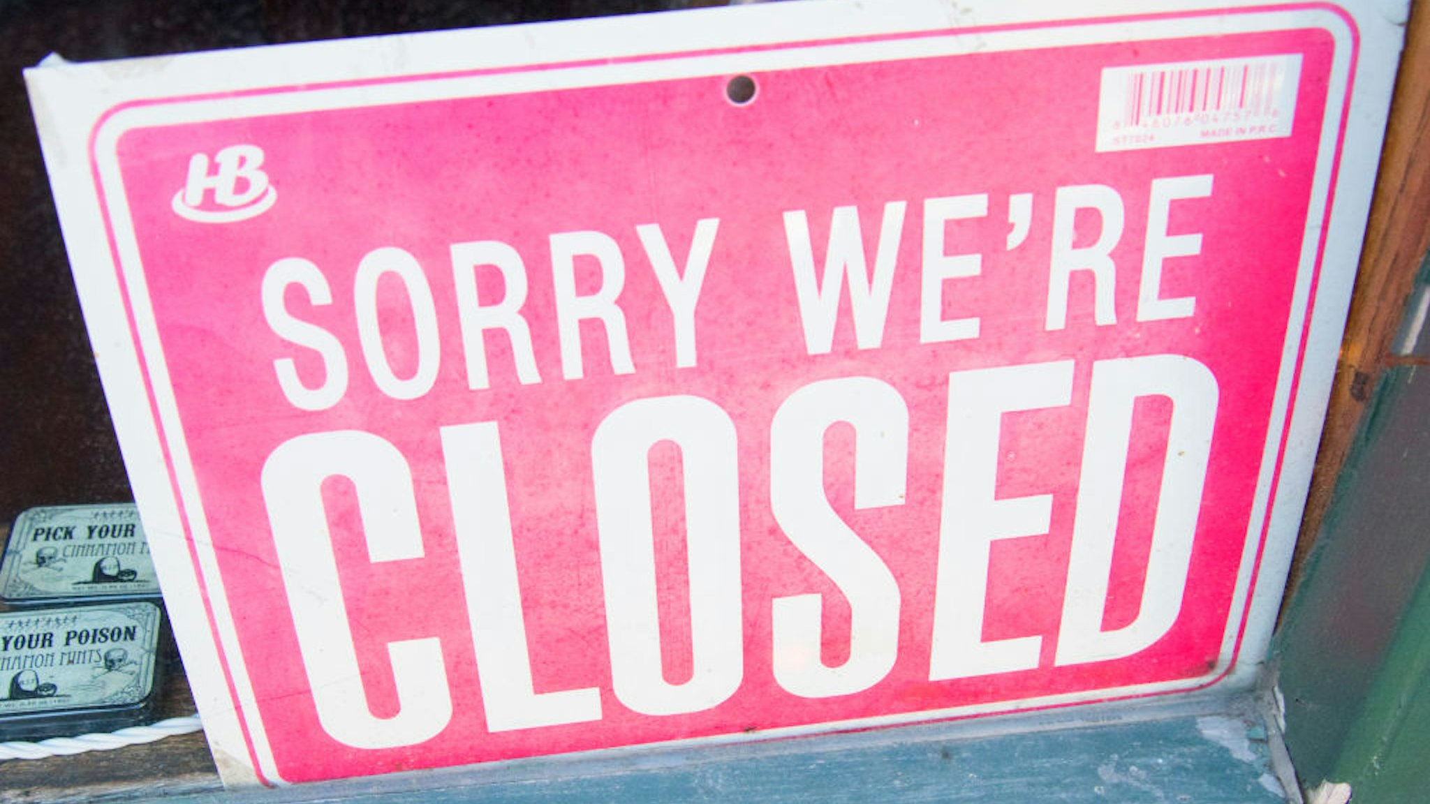 Sign in Store Window, Sorry Were Closed. (Photo by: Education Images/Universal Images Group via Getty Images)