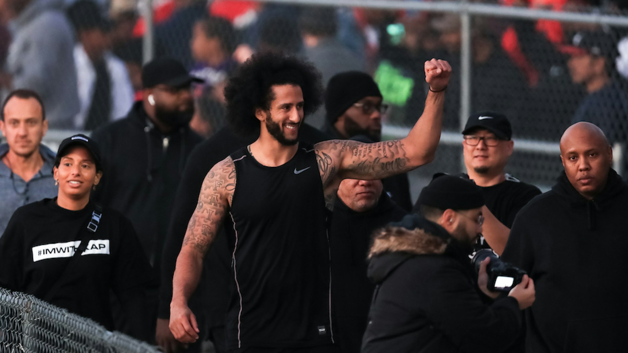 Colin Kaepernick visits with fans following his NFL workout held at Charles R Drew high school on November 16, 2019 in Riverdale, Georgia. (Photo by Carmen Mandato/Getty Images)