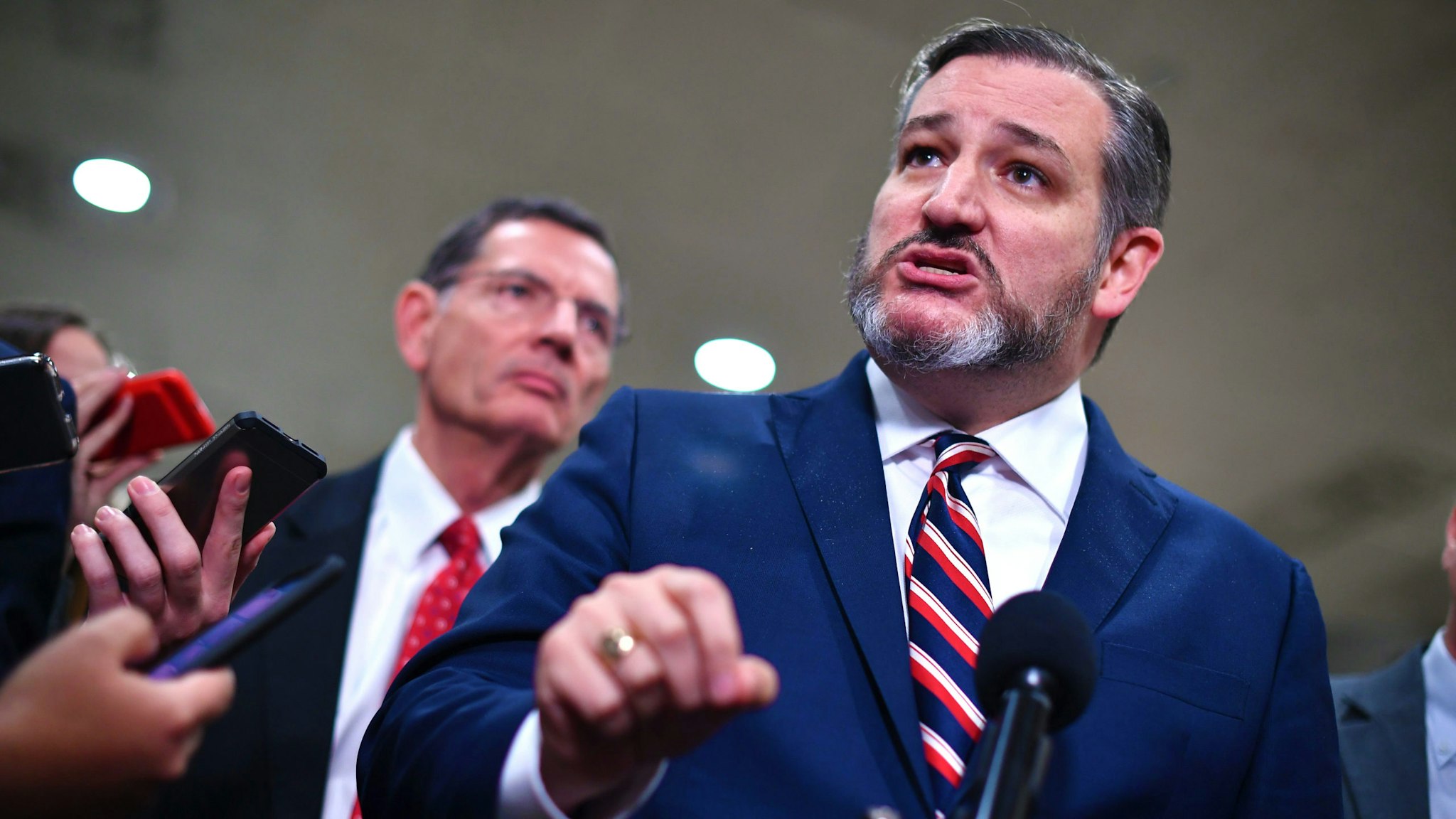 US Senator from Texas, Ted Cruz speaks to the media during a recess in the impeachment trial of US President Donald Trump at the US Capitol in Washington, DC on January 27, 2020. - White House lawyers were to resume their defense of President Donald Trump at his Senate impeachment trial Monday as explosive revelations from former national security advisor John Bolton increased pressure on Republicans to call him as a witness.