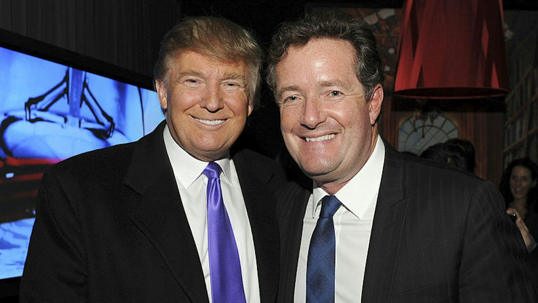 Television Personality Donald Trump and journalist Piers Morgan attend the celebration of Perfumania and Kim Kardashian�s appearance on NBC�s "The Apprentice" at the Provocateur at The Hotel Gansevoort on November 10, 2010 in New York, New York. (Photo by Mathew Imaging/WireImage)