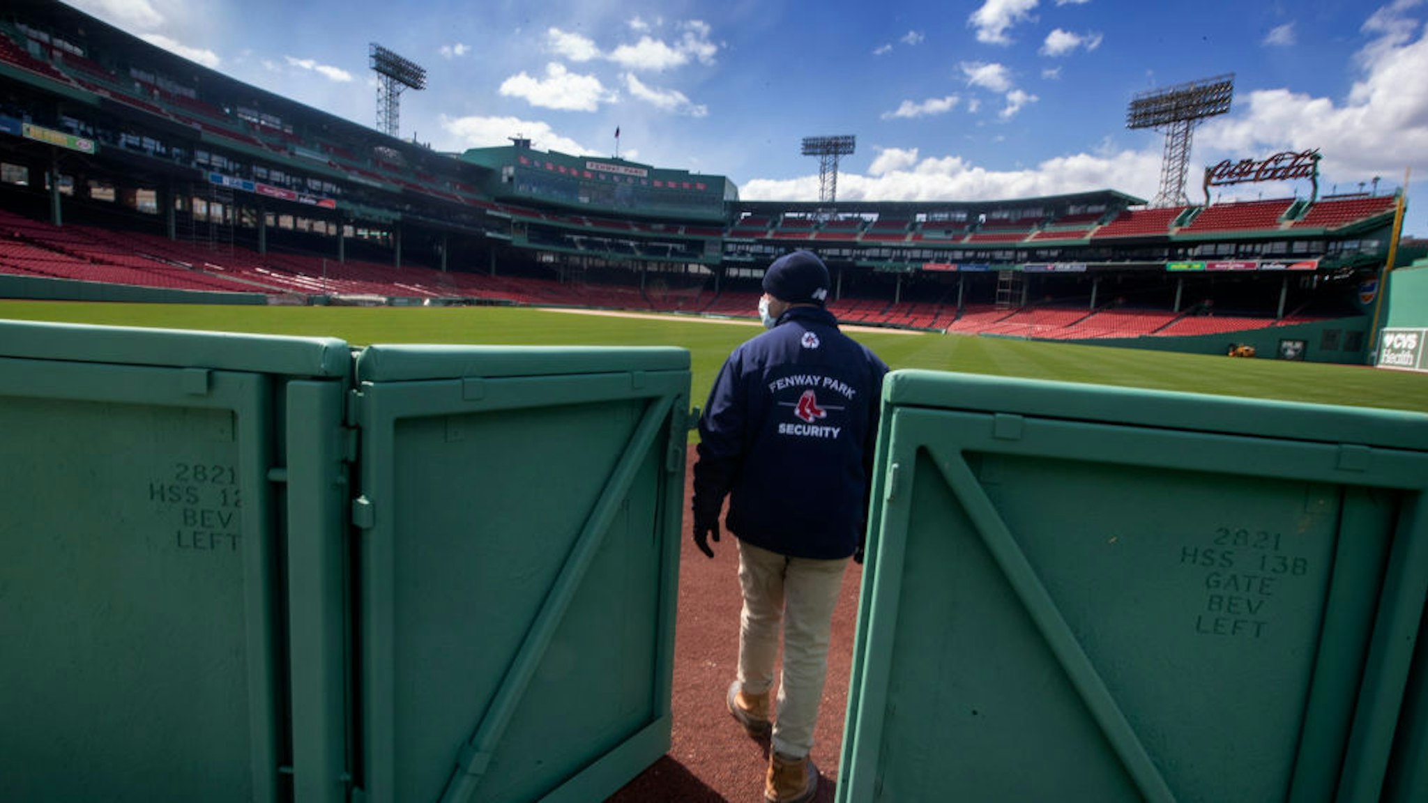Mike Carpino from Boston Red Sox security leaves the Red Sox bullpen at Fenway Park on April 16, 2020. Fenway Park in Boston remains closed during the coronavirus emergency. (Photo by Stan Grossfeld/The Boston Globe via Getty Images)