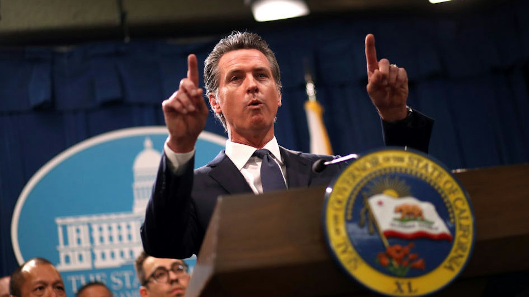 California Gov. Gavin Newsom speaks during a news conference with California attorney General Xavier Becerra at the California State Capitol on August 16, 2019 in Sacramento, California. California attorney genera Xavier Becerra and California Gov. Gavin Newsom announced that the State of California is suing the Trump administration challenging the legality of a new "public charge" rule that would make it difficult for immigrants to obtain green cards who receive public assistance like food stamps and Medicaid. (Photo by Justin Sullivan/Getty Images)