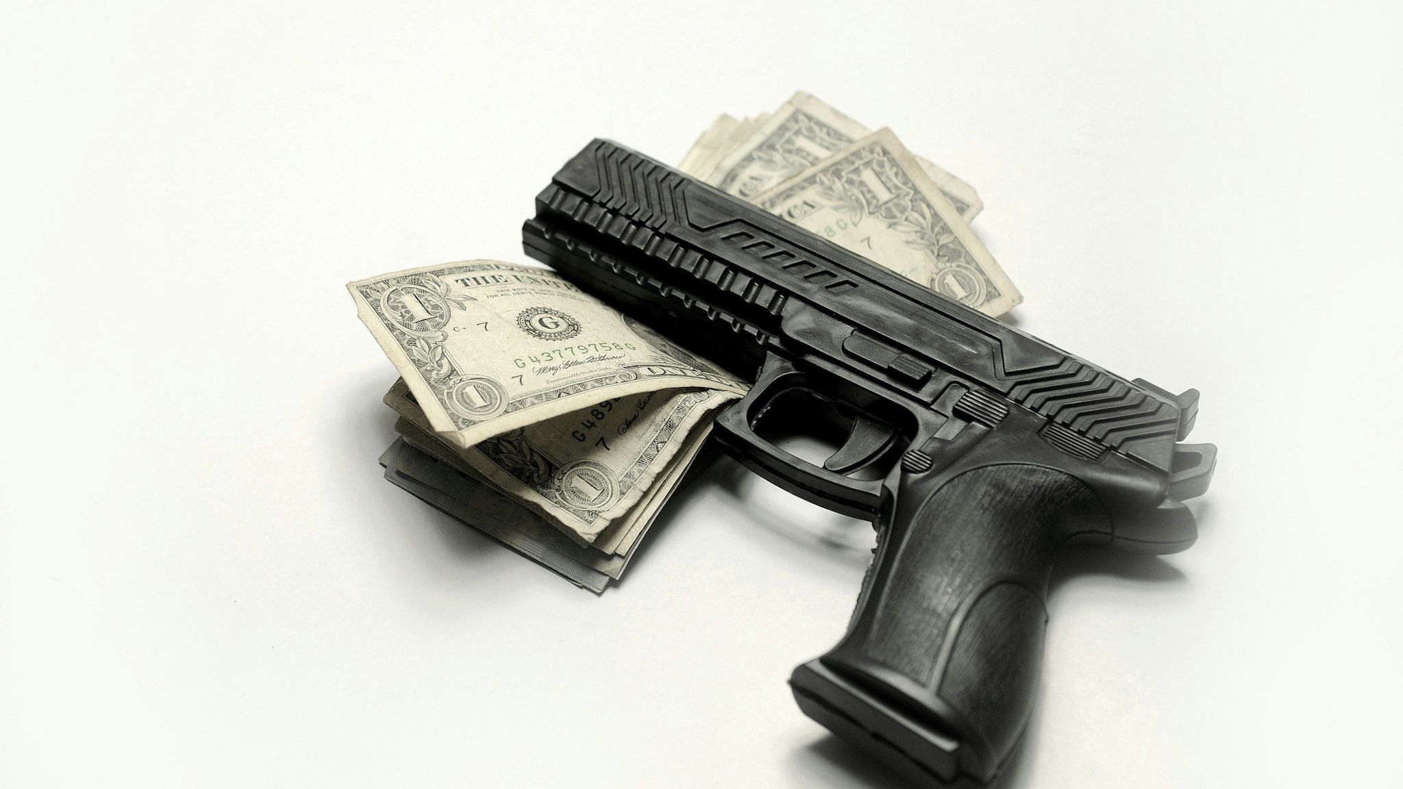 gun and money