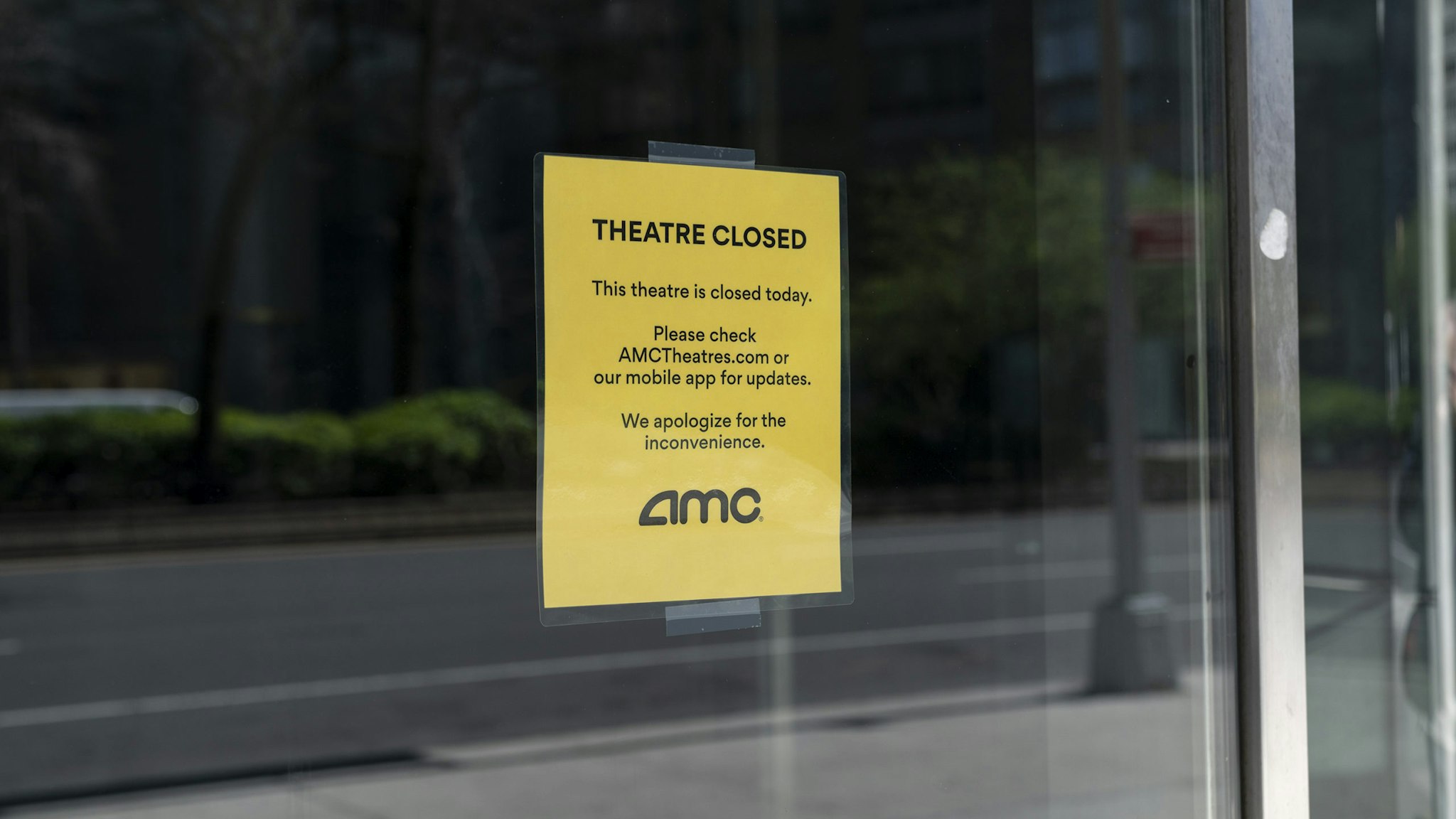 NEW YORK, UNITED STATES - 2020/03/21: Sign on front door of Lincoln Square AMC movie theatre about closing because of COVID-19 outbreak on Broadway. (Photo by Lev Radin/Pacific Press/LightRocket via Getty Images)