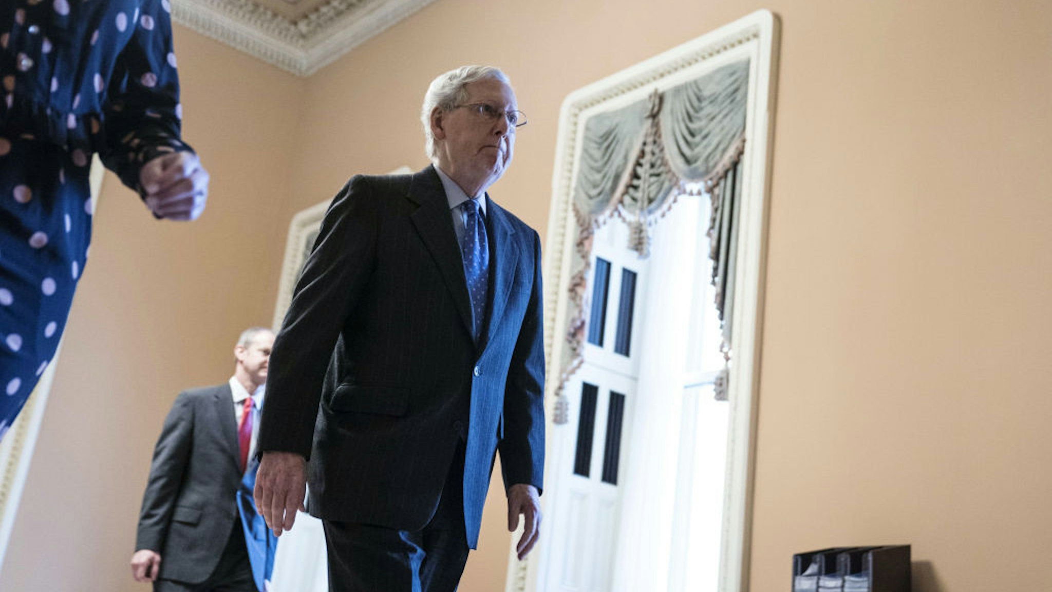 Senate Majority Leader Mitch McConnell, a Republican from Kentucky, walks through the U.S. Capitol in Washington, D.C., U.S., on Tuesday, March 24, 2020.