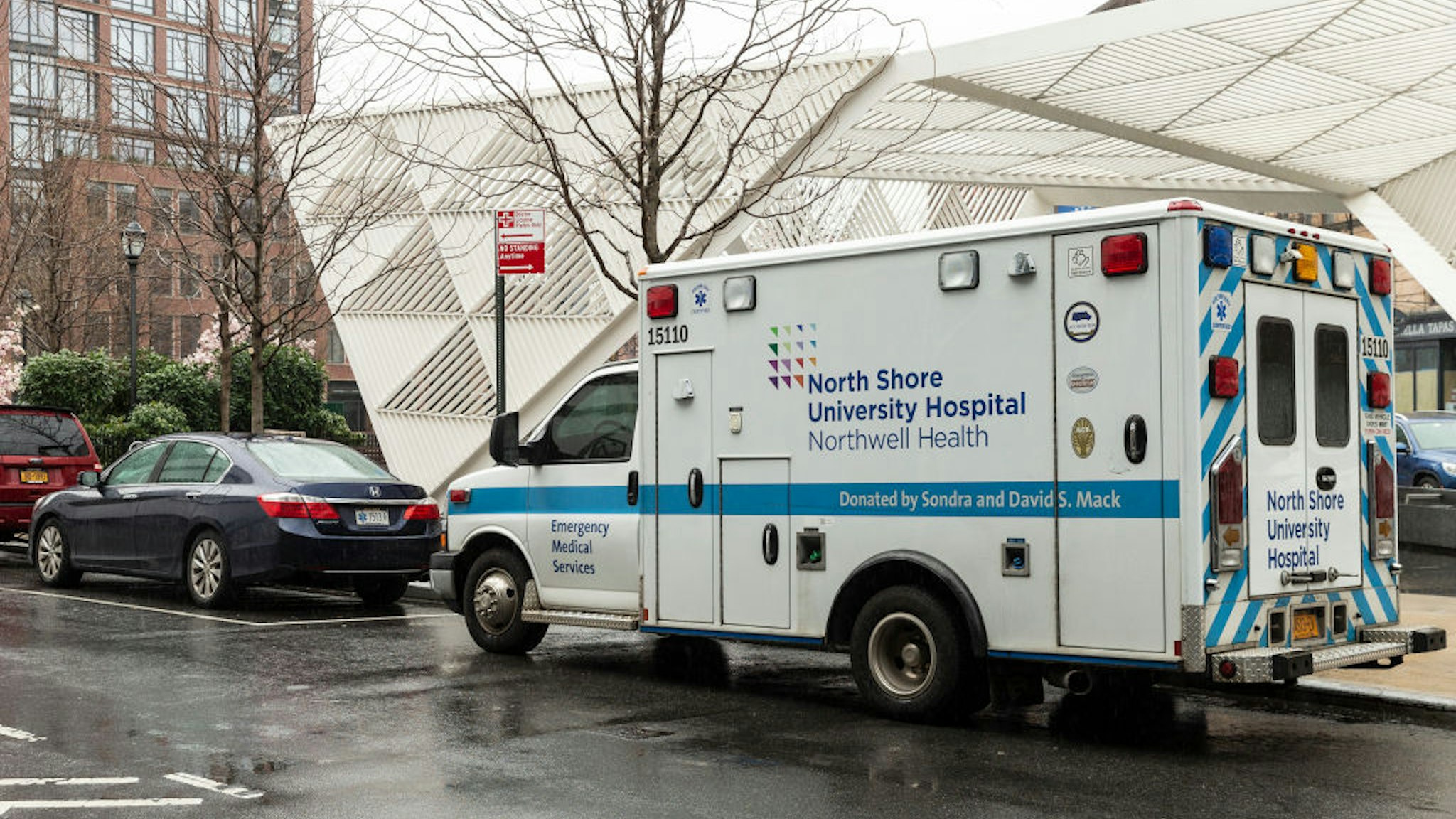 Medical emergency vehicle parked next to Lenox Health Medical Pavilion part of Northwell Health system in Greenwich Village of Manhattan.
