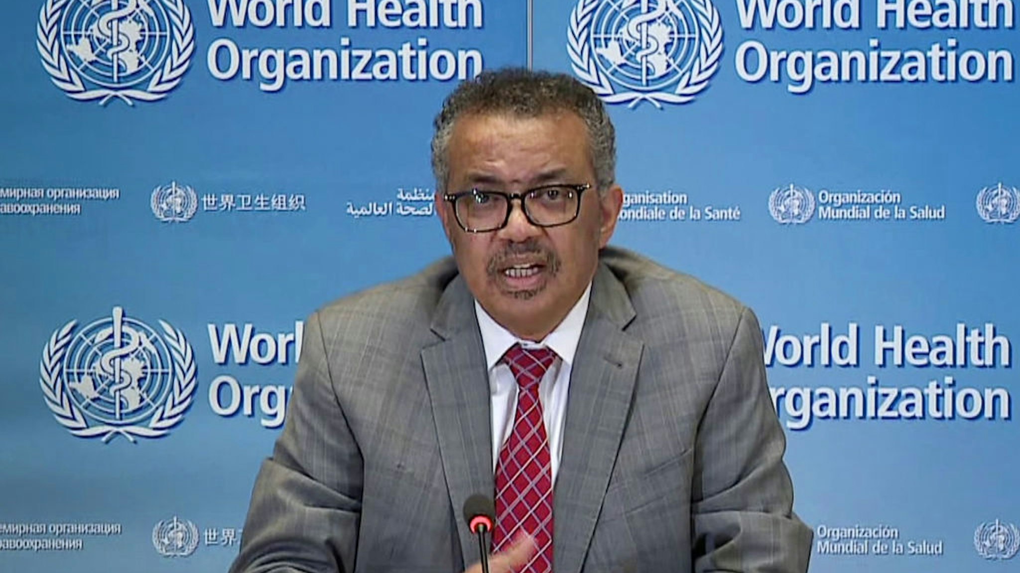 A TV grab taken from the World Health Organization website shows WHO Chief Tedros Adhanom Ghebreyesus via video link as he delivers a news briefing on COVID-19 (novel coronavirus) from the WHO headquarters in Geneva on March 30, 2020.