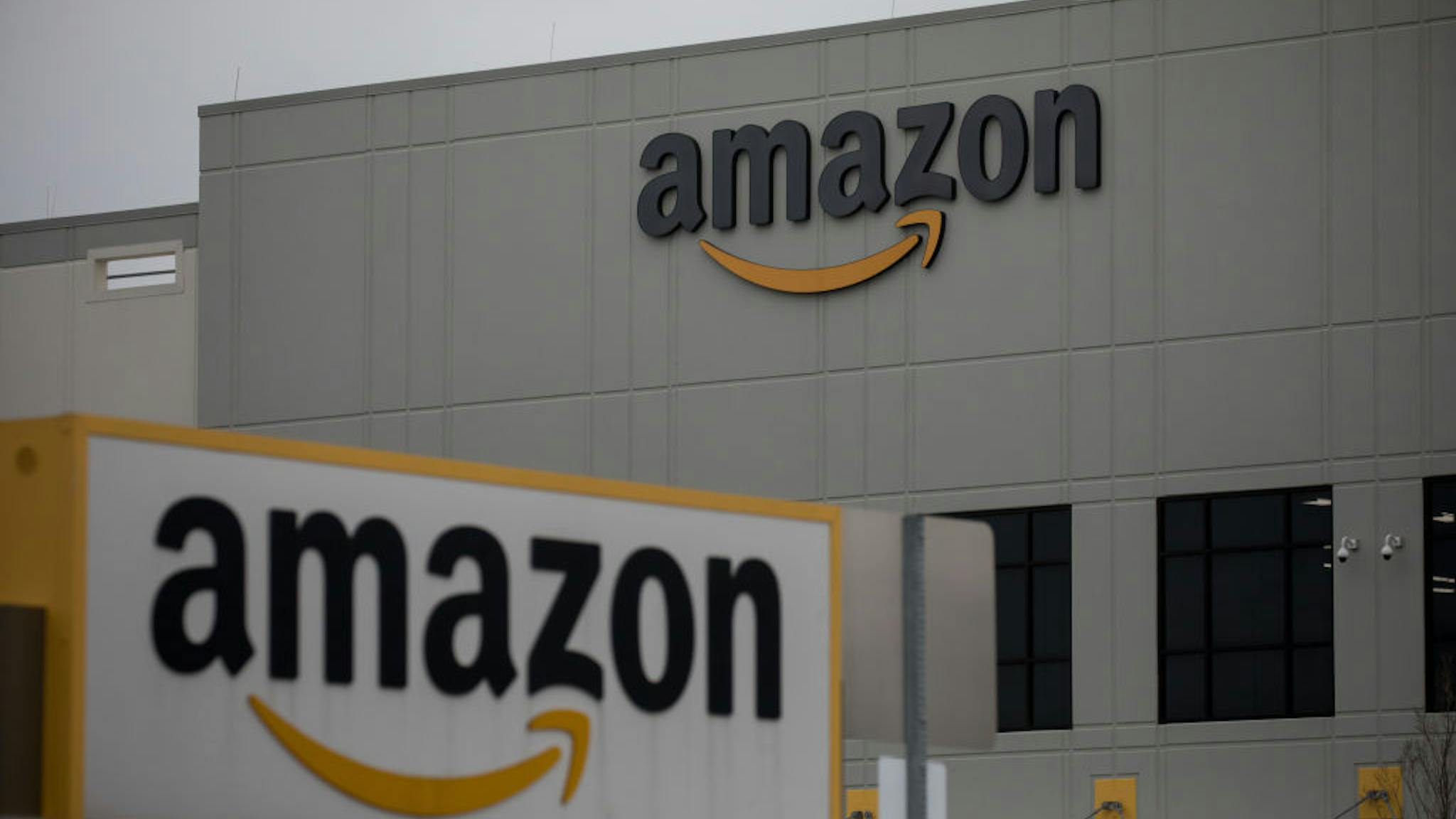 Amazon Amazon.com Inc. signage is displayed in front of a warehouse in the Staten Island borough of New York, U.S., on Tuesday, March 31, 2020.