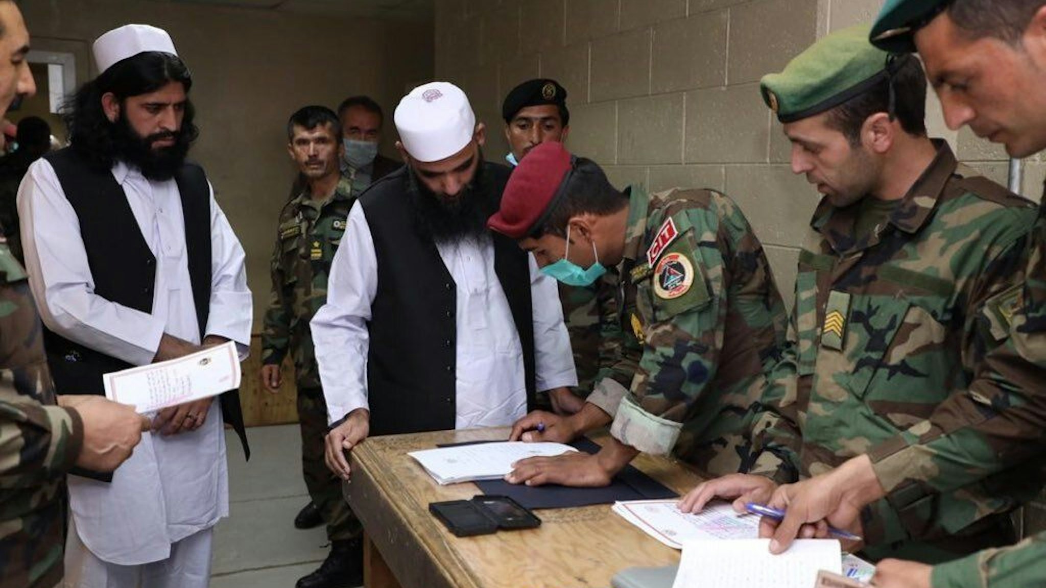 Procedures of Taliban prisoners are being made, in Kabul, Afghanistan on April 9, 2020. The Afghan government released 100 Taliban prisoners following a presidential decree, despite the insurgents' withdrawal from intra-Afghan peace talks.