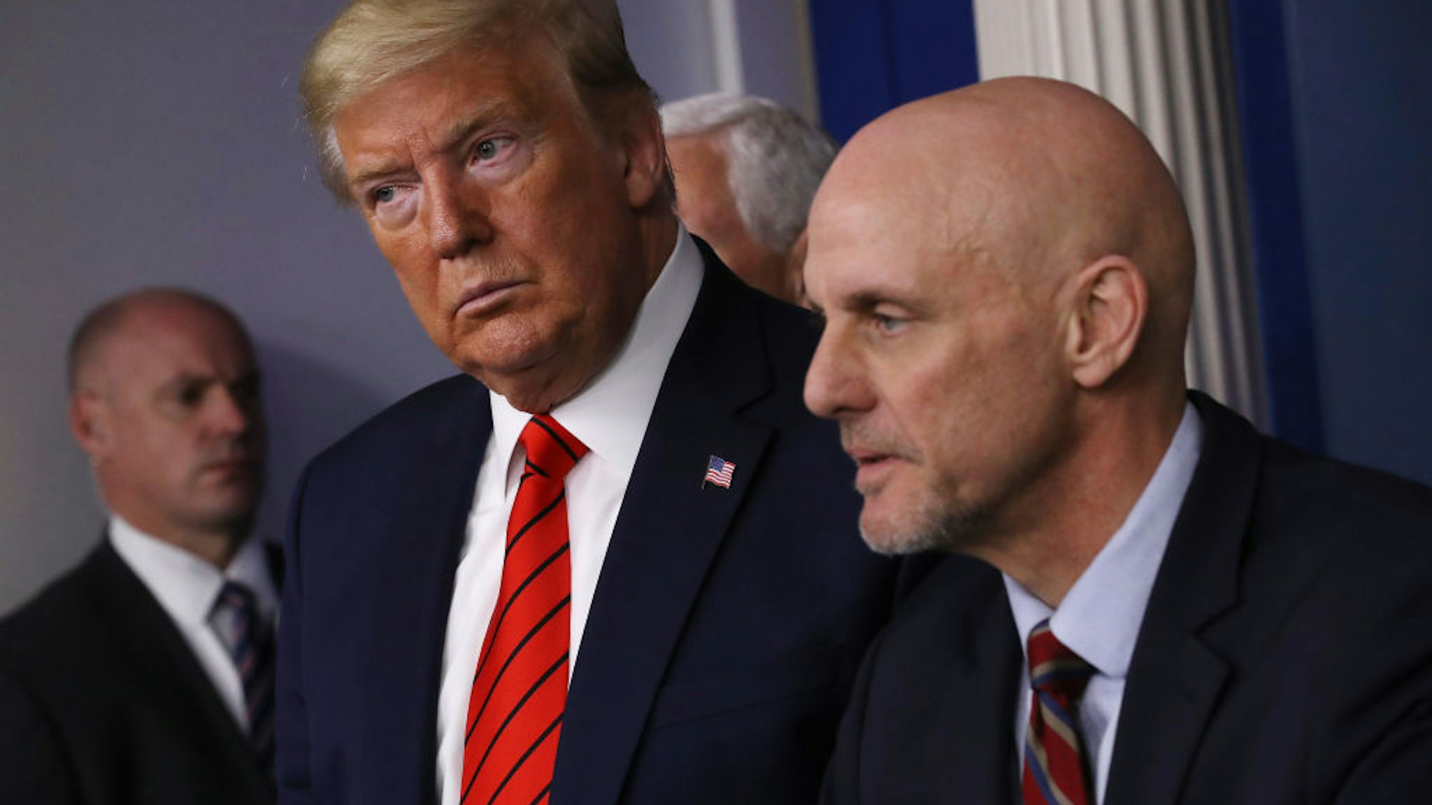 U.S. President Donald Trump listens to FDA Commissioner Stephen Hahn during a news conference with members of the White House coronavirus task force in the Brady Press Briefing Room at the White House March 19, 2020 in Washington, DC.