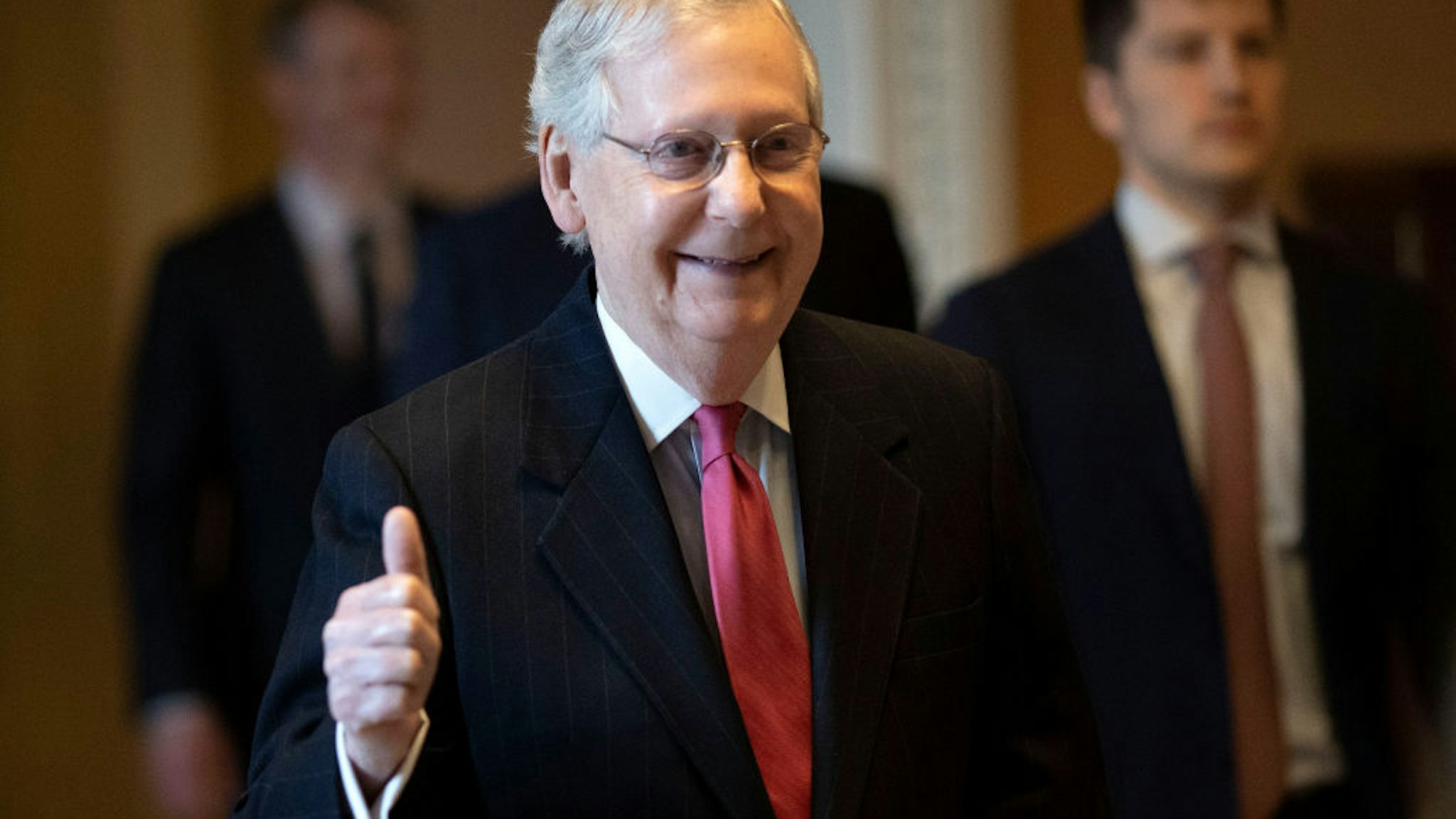 U.S. Senate Majority Leader Mitch McConnell (R-KY) gives a thumbs up sign after speaking on the floor of the U.S. Senate on March 25, 2020 in Washington, DC.