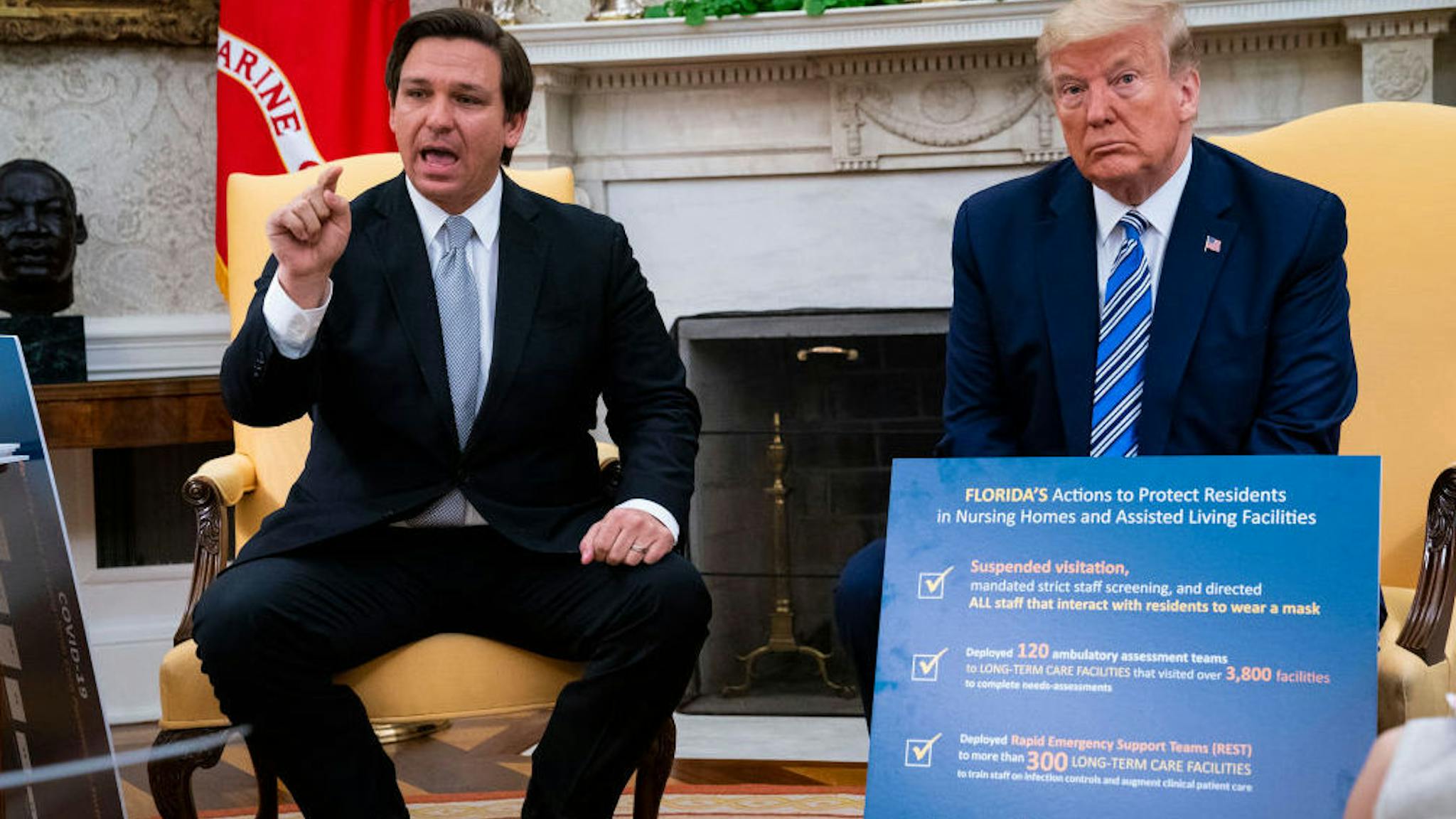 Ron DeSantis, Donald Trump Florida Gov. Ron DeSantis (L) speaks while meeting with U.S. President Donald Trump in the Oval Office of the White House on April 28, 2020 in Washington, DC. Trump met with DeSantis to discuss ways that Florida is planning to gradually re-open the state in the wake of the COVID-19 pandemic.
