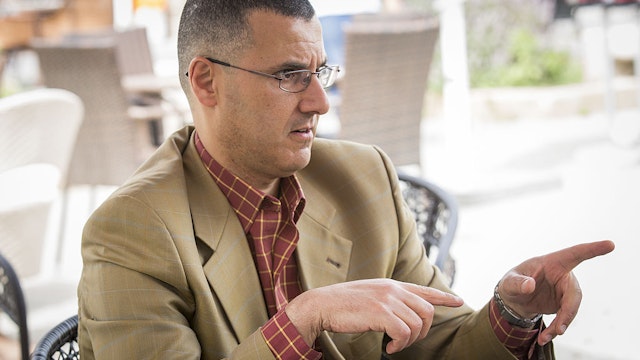 Omar Barghouti speaks to artists travelling with the 2014 Palestine Festival of Literature about the Boycott, Divestment and Sanctions (BDS) campaign against Israel on June 3, 2014 in Acre, Israel.