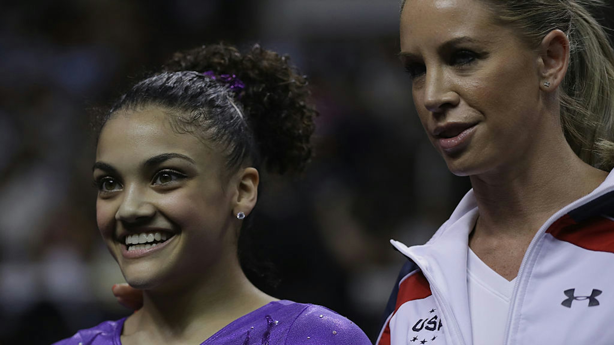 Lauren Hernandez with Maggie Haney after competing on the balance beam during day 1 of the 2016 U.S. Olympic Women's Gymnastics Team Trials at SAP Center on July 8, 2016 in San Jose, California.