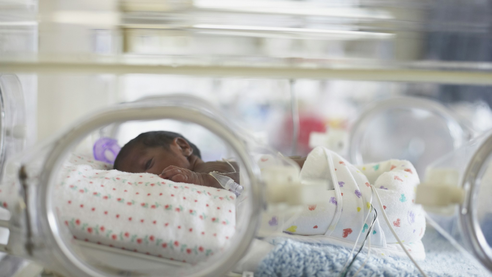 African American baby in hospital incubator - stock photo