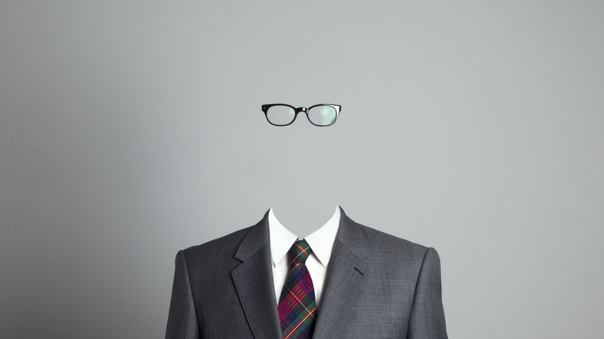 Business man with no face, looking at camera - stock photo