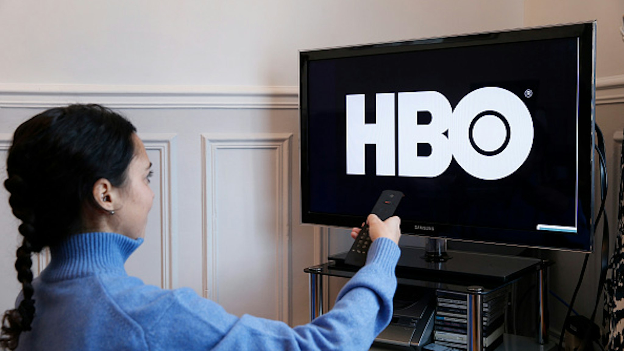 PARIS, FRANCE - NOVEMBER 21: In this photo illustration, the HBO logo is displayed on a television screen on November 21, 2019 in Paris, France. HBO is an American pay TV channel that produces and broadcasts TV shows.