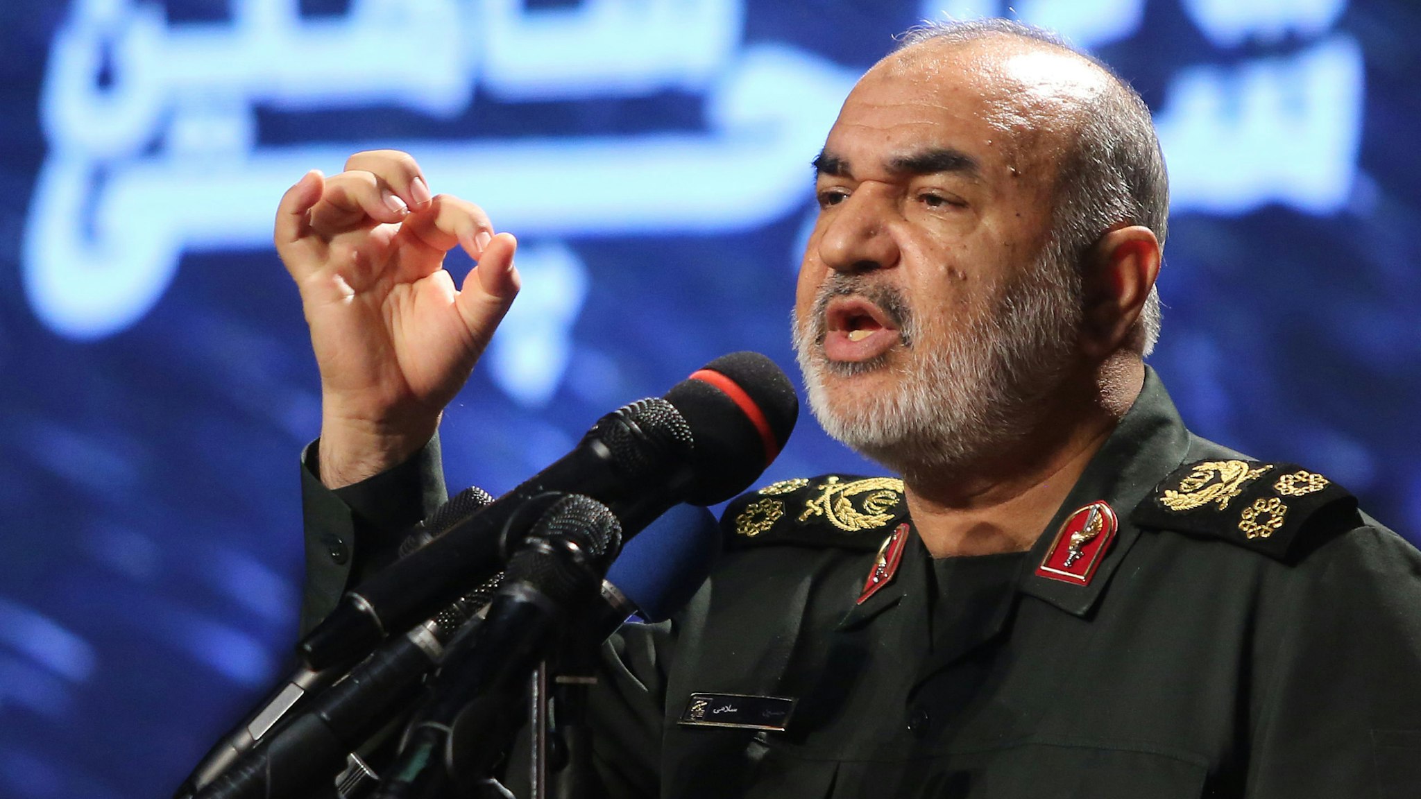 Iranian Revolutionary Guards commander Major General Hossein Salami speaks at Tehran's Islamic Revolution and Holy Defence museum, during the unveiling of an exhibition of what Iran says are US and other drones captured in its territory, in the capital Tehran on September 21, 2019. - Iran's Revolutionary Guards commander today warned any country that attacks the Islamic republic will see its territory become the "main battlefield" as he opened an exhibition of captured drones.