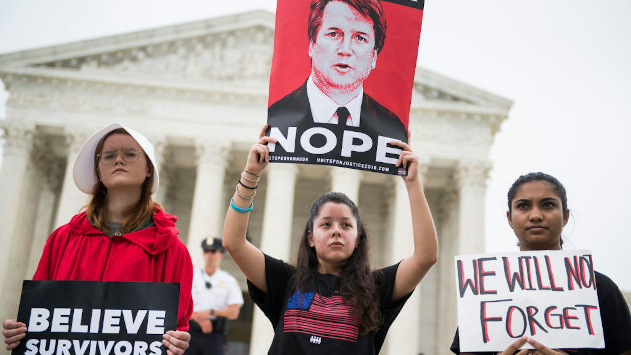 Protesters demonstrate in front of the Supreme Court to oppose the new associate justice Brett Kavanaugh on his first day of hearing arguments on October 4, 2018. (Photo By Tom Williams/CQ Roll Call)