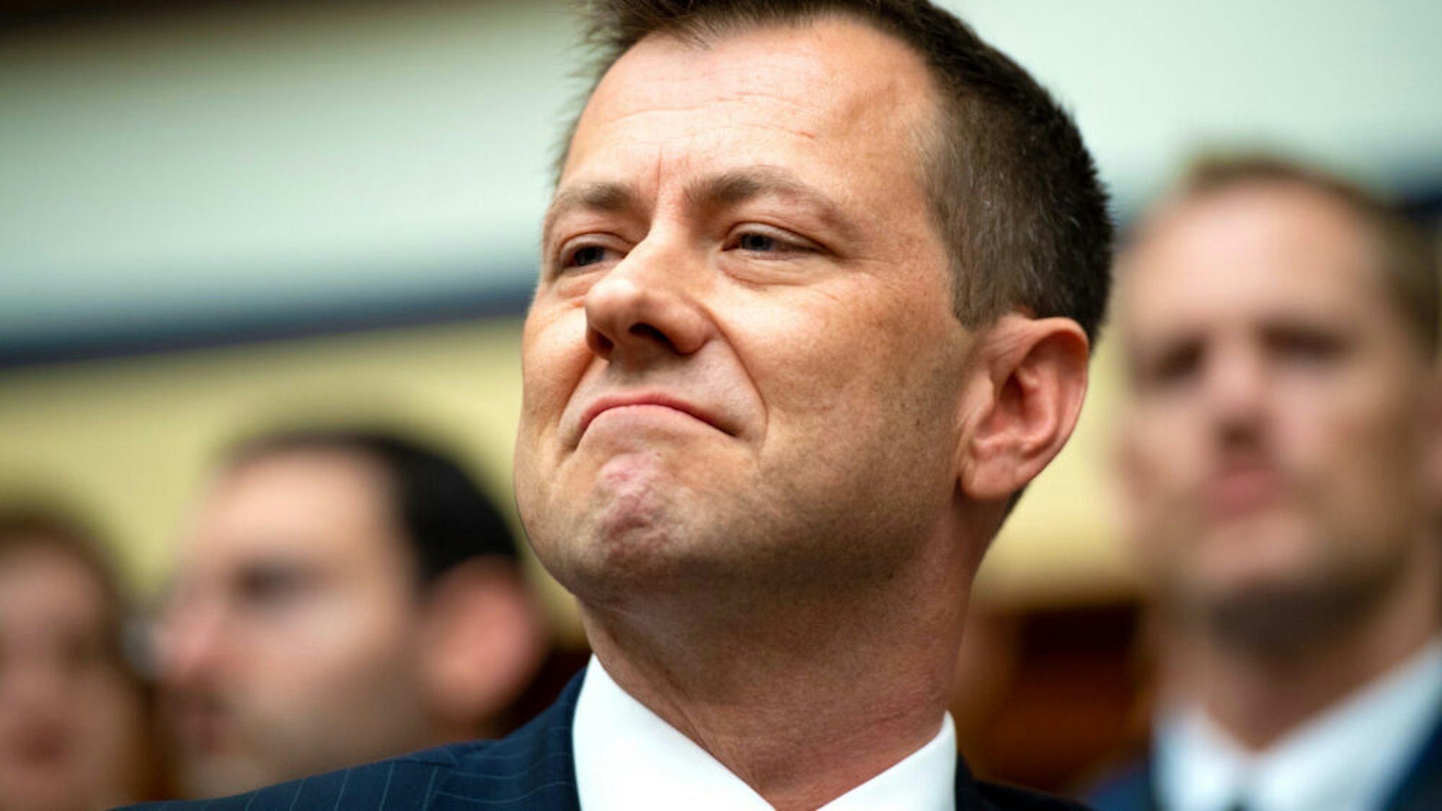 Deputy Assistant FBI Director Peter Strzok testifies on FBI and Department of Justice actions during the 2016 Presidential election during a House Joint committee hearing on Capitol Hill in Washington, DC, July 12, 2018. - An FBI agent assailed as biased by Donald Trump after it emerged he railed against the president in private messages with his lover, said Thursday such attacks are bolstering Russia's Vladimir Putin and tearing the United States apart. Ahead of a congressional hearing on alleged anti-Trump bias in the Federal Bureau of Investigation, Peter Strzok denied assertions that the investigation into Russian meddling in the 2016 election was a politicized probe targeting the president.