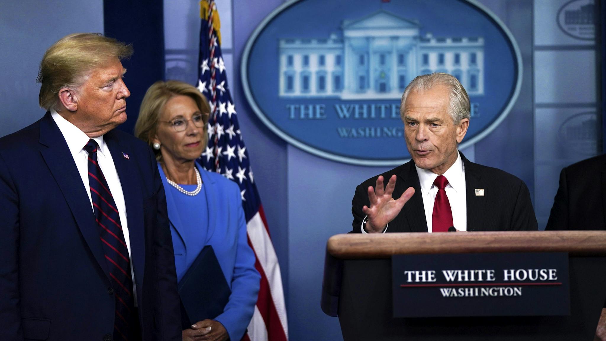 White House Coronavirus Task Force Holds Daily Briefing WASHINGTON, DC - MARCH 27: White House Trade and Manufacturing Policy Director Peter Navarro speaks as U.S. President Donald Trump and Secretary of Education Betsy DeVos during a briefing on the coronavirus pandemic in the press briefing room of the White House on March 27, 2020 in Washington, DC. President Trump signed the H.R. 748, the CARES Act on Friday afternoon. Earlier in the day, the U.S. House of Representatives approved the $2 trillion stimulus bill that lawmakers hope will battle the economic effects of the COVID-19 pandemic.