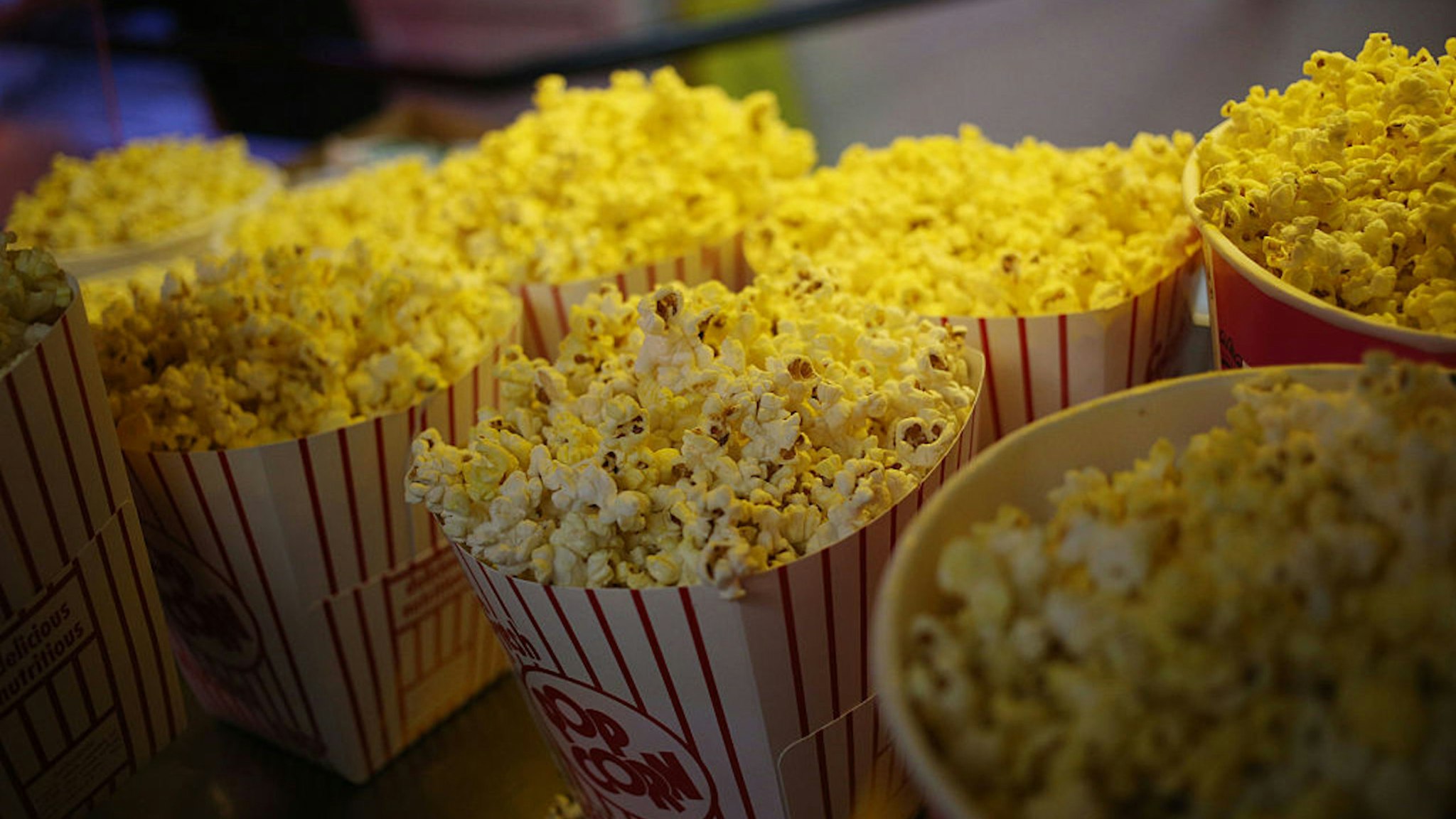 Freshly popped popcorn is displayed for sale inside the snack bar at the Georgetown Drive-In movie theater in Georgetown, Indiana, U.S., on Friday, July 17, 2015. The Georgetown Drive-In opened in 1951 and has been family-owned and operated for the past fifty years.