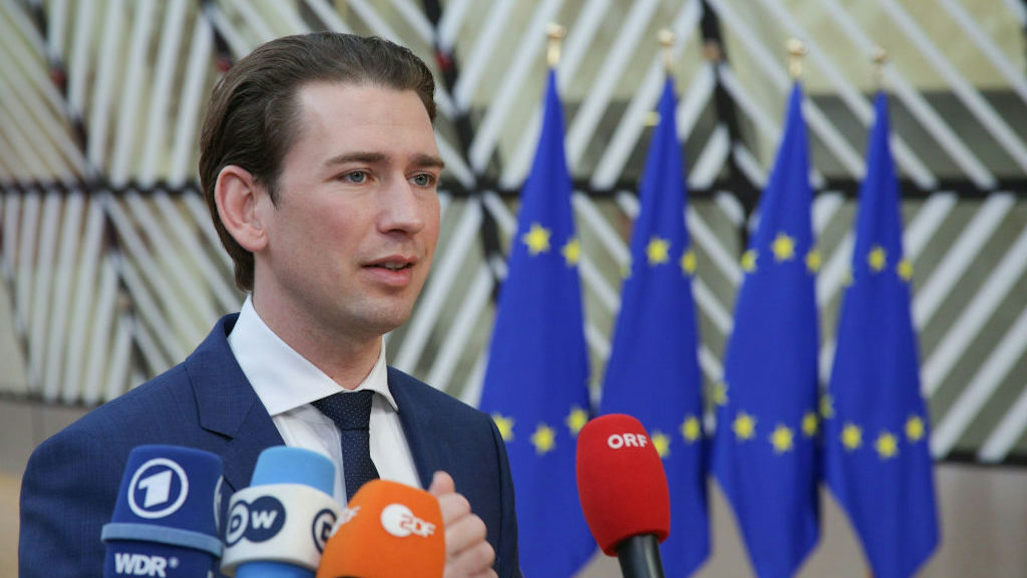 Sebastian Kurz, the Federal Chancellor of Austria as seen arriving at the European Council . Sebastian Kurz attends the EUCO, walking in Forum Europa building on the red carpet with the European flags, having a doorstep statement, talking to journalists, media and press representatives for the intense negotiations on the EU long term budget financial framework for 2021-2027 at a special European Council, EURO summit, EU leaders meeting in Brussels, Belgium. February 20, 2020 (Photo by Nicolas Economou/NurPhoto)