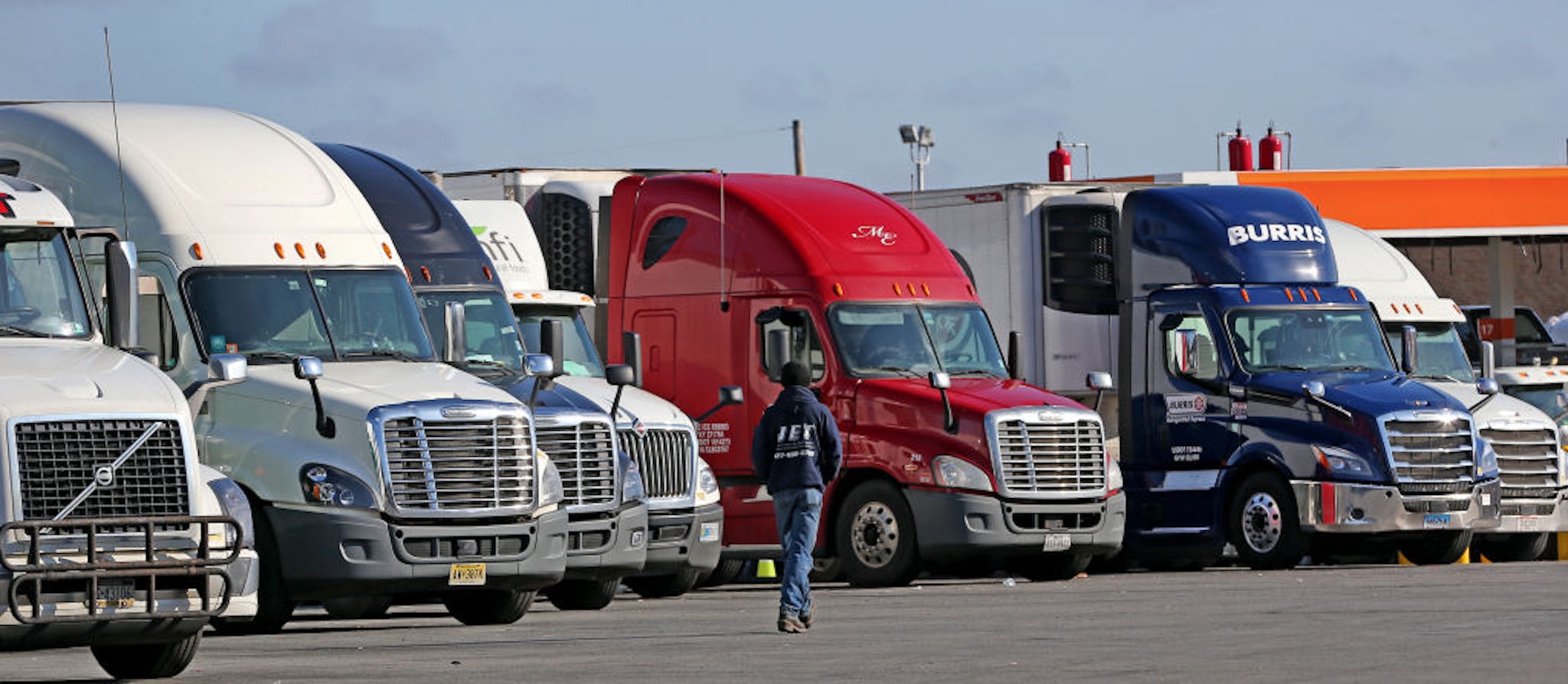 Truck drivers take a rest at the Westborough Service Plaza in Westborough, MA along the Massachusetts Turnpike on March 26, 2020. Even as the COVID-19 pandemic has forced a majority of people to work from home, most of the nations 3.5 million drivers have kept rolling, trying to mitigate unprecedented supply chain disruptions by continuing to move goods around the nation. (Photo by David L. Ryan/The Boston Globe via Getty Images)
