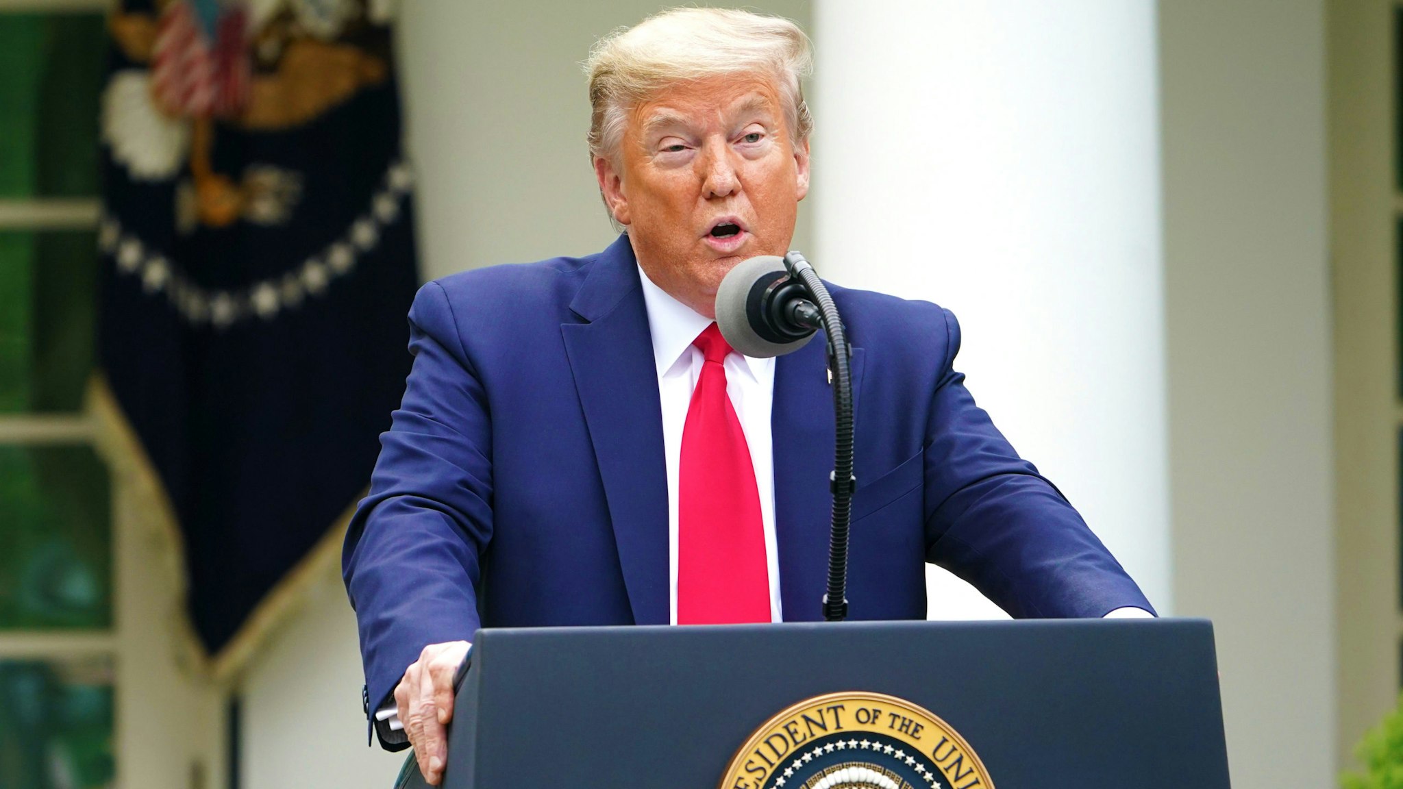 US President Donald Trump speaks during the daily briefing on the novel coronavirus, which causes COVID-19, in the Rose Garden of the White House on April 14, 2020, in Washington, DC.
