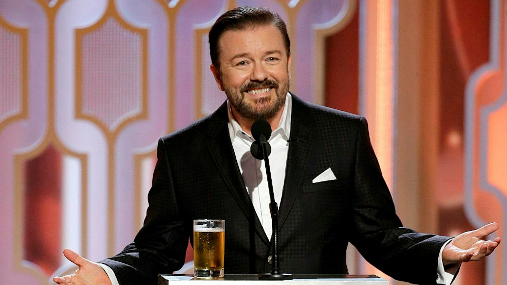 BEVERLY HILLS, CA - JANUARY 10: In this handout photo provided by NBCUniversal, Host Ricky Gervais speaks onstage during the 73rd Annual Golden Globe Awards at The Beverly Hilton Hotel on January 10, 2016 in Beverly Hills, California. (Photo by