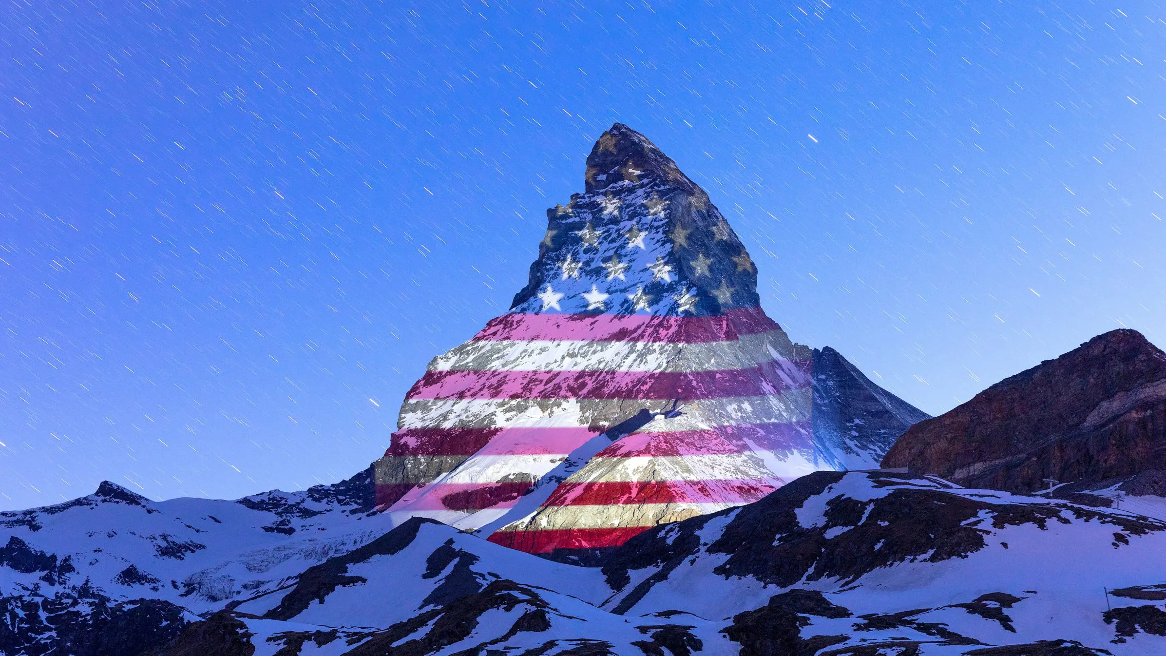 Matterhorn In Swiss Alps Lit Up With American Flag In Show Of Solidarity During Coronavirus