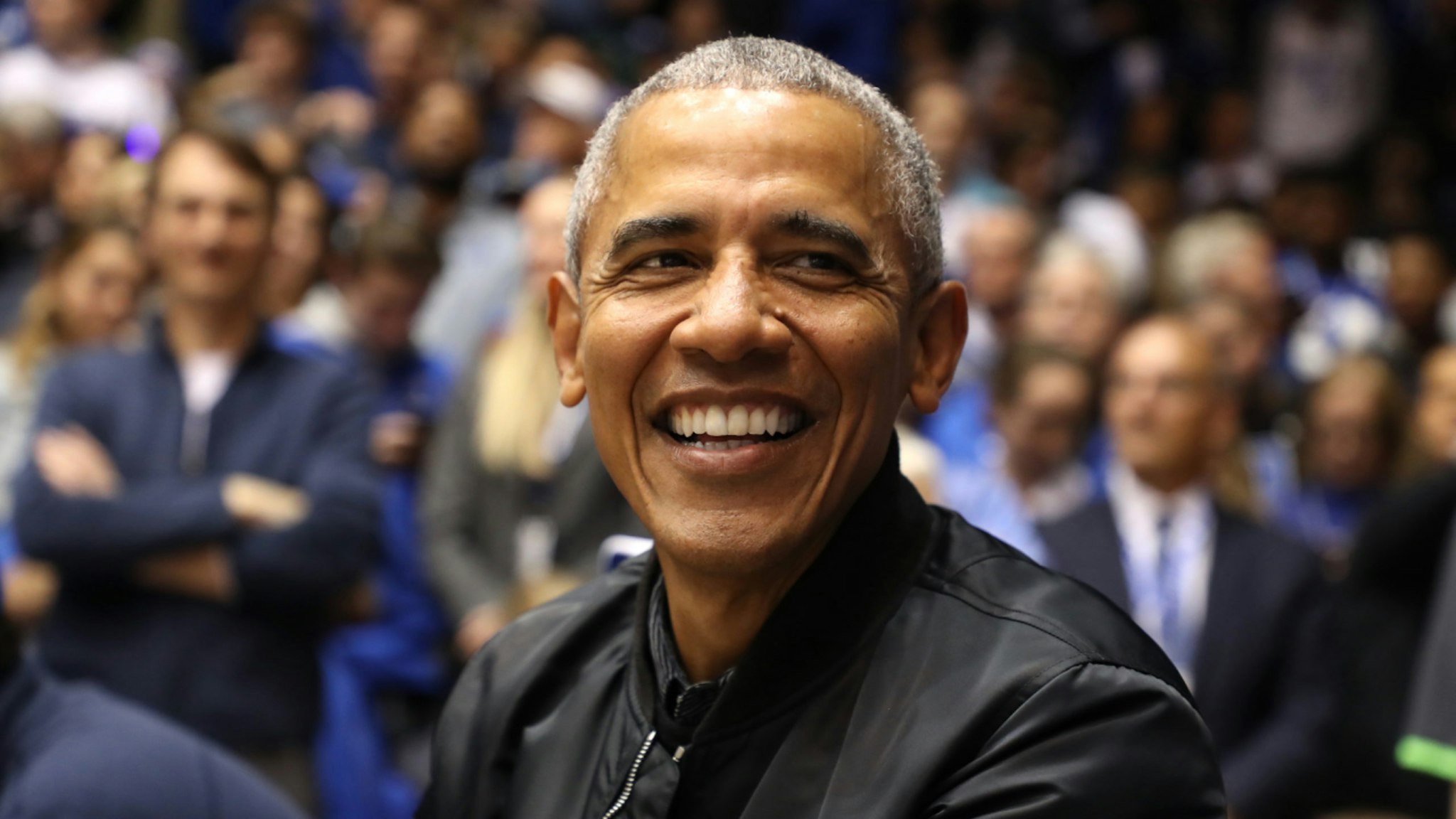 Former President of the United States, Barack Obama, watches on during the game between the North Carolina Tar Heels and Duke Blue Devils at Cameron Indoor Stadium on February 20, 2019 in Durham, North Carolina.